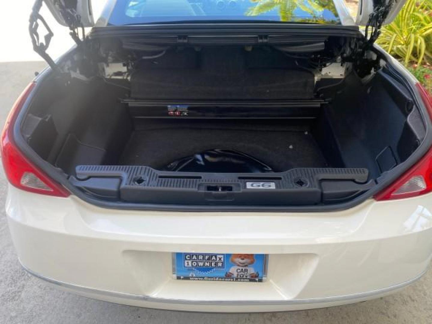 2008 White Diamond Tricoat /Light Taupe Pontiac G6 GT LOW MILES 44,047 (1G2ZH361484) with an 3.9L VVT V6 SFI Engine engine, Automatic transmission, located at 4701 North Dixie Hwy, Pompano Beach, FL, 33064, (954) 422-2889, 26.240938, -80.123474 - OUR WEBPAGE FLORIDACARS1.COM HAS OVER 100 PHOTOS AND FREE CARFAX LINK 2008 PONTIAC G6 GT VIN: 1G2ZH361484136254 1 G 2 Z H 3 6 1 4 8 4 1 3 6 2 5 4 CONVERTIBLE 3.9L V6 F GASOLINE FRONT WHEEL DRIVE Top Features Alloy Wheels Front Seat Heaters Hard Top Leather Seats Monsoon Sound Premium Package Satelli - Photo#81