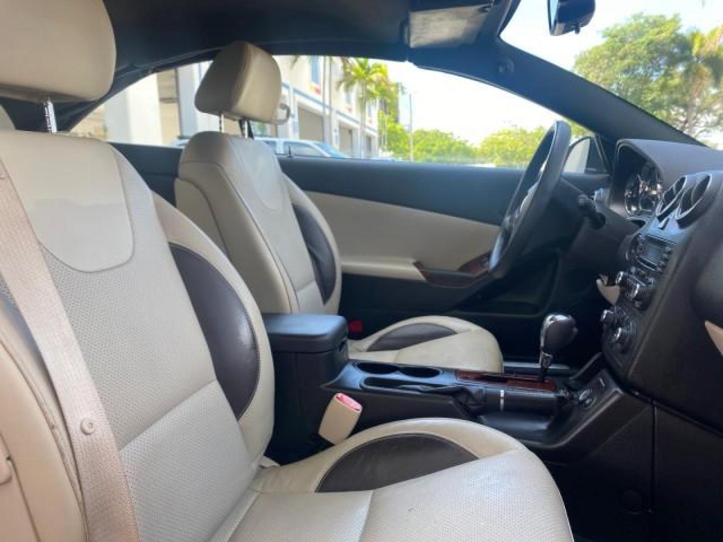 2008 White Diamond Tricoat /Light Taupe Pontiac G6 GT LOW MILES 44,047 (1G2ZH361484) with an 3.9L VVT V6 SFI Engine engine, Automatic transmission, located at 4701 North Dixie Hwy, Pompano Beach, FL, 33064, (954) 422-2889, 26.240938, -80.123474 - OUR WEBPAGE FLORIDACARS1.COM HAS OVER 100 PHOTOS AND FREE CARFAX LINK 2008 PONTIAC G6 GT VIN: 1G2ZH361484136254 1 G 2 Z H 3 6 1 4 8 4 1 3 6 2 5 4 CONVERTIBLE 3.9L V6 F GASOLINE FRONT WHEEL DRIVE Top Features Alloy Wheels Front Seat Heaters Hard Top Leather Seats Monsoon Sound Premium Package Satelli - Photo#93