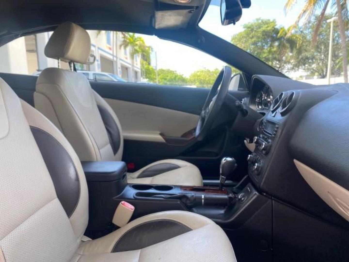 2008 White Diamond Tricoat /Light Taupe Pontiac G6 GT LOW MILES 44,047 (1G2ZH361484) with an 3.9L VVT V6 SFI Engine engine, Automatic transmission, located at 4701 North Dixie Hwy, Pompano Beach, FL, 33064, (954) 422-2889, 26.240938, -80.123474 - OUR WEBPAGE FLORIDACARS1.COM HAS OVER 100 PHOTOS AND FREE CARFAX LINK 2008 PONTIAC G6 GT VIN: 1G2ZH361484136254 1 G 2 Z H 3 6 1 4 8 4 1 3 6 2 5 4 CONVERTIBLE 3.9L V6 F GASOLINE FRONT WHEEL DRIVE Top Features Alloy Wheels Front Seat Heaters Hard Top Leather Seats Monsoon Sound Premium Package Satelli - Photo#94