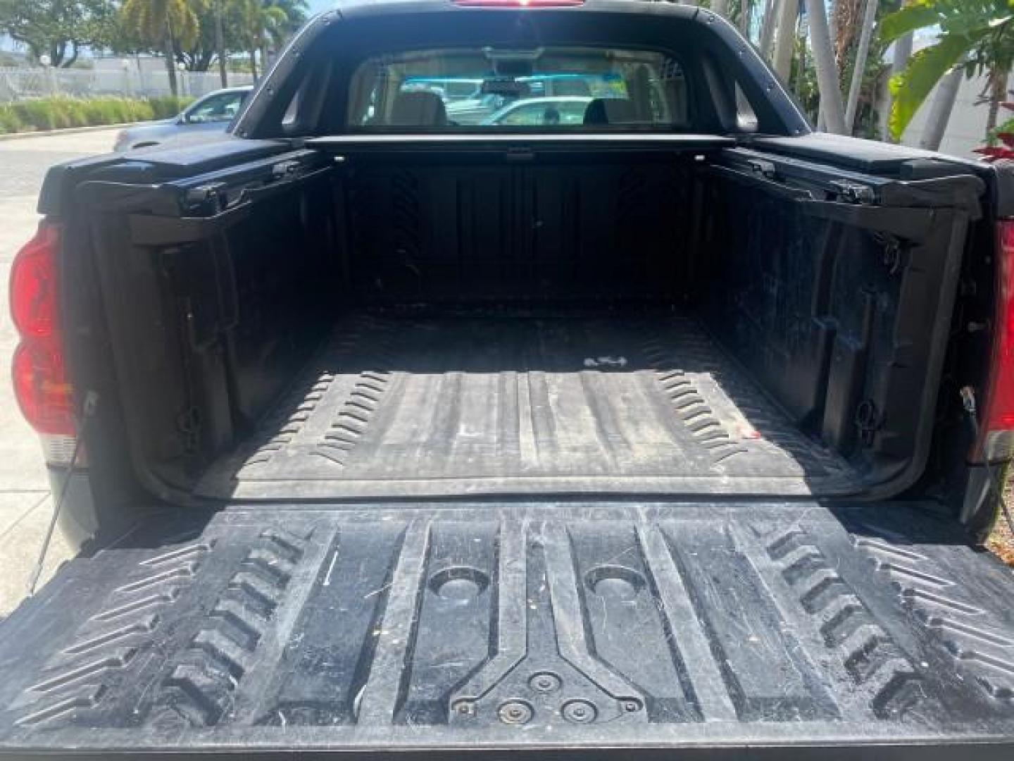 2006 Bermuda Blue Metallic /Gray/Drk Charcoal Chevrolet Avalanche LS LOW MILES 66,207 FLORIDA (3GNEC12Z56G) with an 5.3L Vortec 5300 V8 SFI Flex-Fuel Engine engine, Automatic transmission, located at 4701 North Dixie Hwy, Pompano Beach, FL, 33064, (954) 422-2889, 26.240938, -80.123474 - OUR WEBPAGE FLORIDACARS1.COM HAS OVER 100 PHOTOS AND FREE CARFAX LINK 2006 CHEVROLET AVALANCHE LS 1500 VIN: 3GNEC12Z56G117650 3 G N E C 1 2 Z 5 6 G 1 1 7 6 5 0 SPORT PICKUP 5.3L V8 F FLEX FUEL REAR WHEEL DRIVE Top Features Alloy Wheels Bed Cover Bed Liner Cloth Seats Rear Entertainment System Tow Hi - Photo#84
