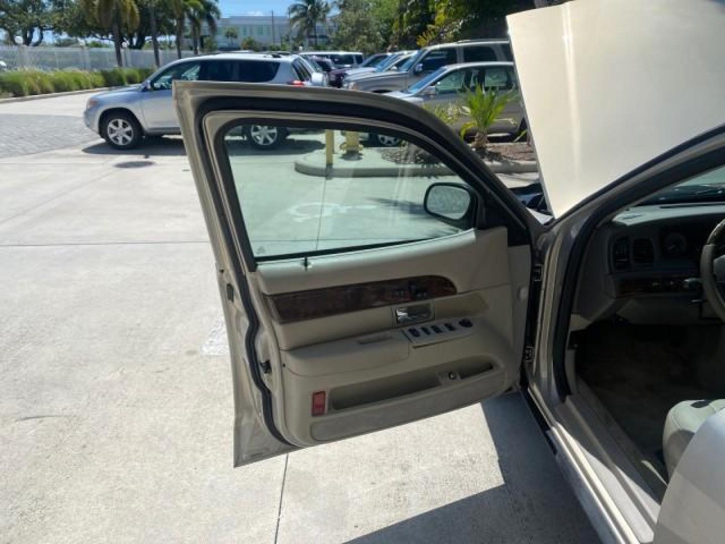 2009 Light Ice Blue Metallic /Light camel Mercury Grand Marquis LS 1 FL LOW MILES 50,955 (2MEHM75V59X) with an 4.6L OHC SEFI FFV V8 Engine engine, Automatic transmission, located at 4701 North Dixie Hwy, Pompano Beach, FL, 33064, (954) 422-2889, 26.240938, -80.123474 - OUR WEBPAGE FLORIDACARS1.COM HAS OVER 100 PHOTOS AND FREE CARFAX LINK 2009 MERCURY GRAND MARQUIS LS VIN: 2MEHM75V59X636303 2 M E H M 7 5 V 5 9 X 6 3 6 3 0 3 SEDAN 4 DR 4.6L V8 F SOHC 16V FLEX FUEL REAR WHEEL DRIVE Top Features Alloy Wheels Leather Seats Basic Features ABS Brakes AM/FM Stereo Air Con - Photo#9