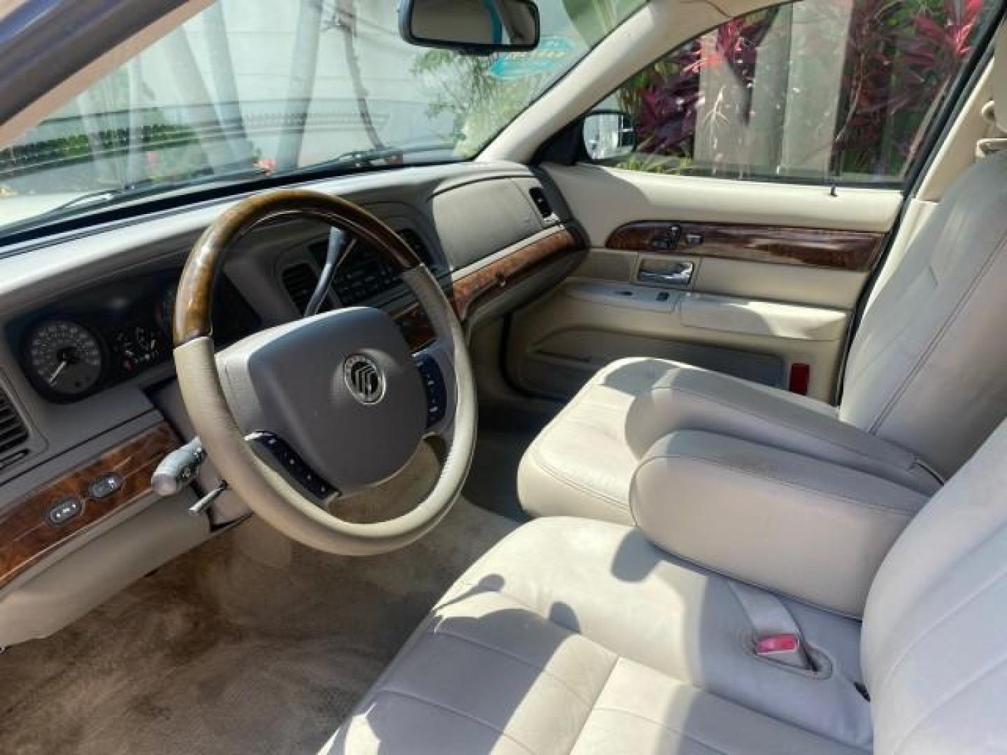 2009 Light Ice Blue Metallic /Light camel Mercury Grand Marquis LS 1 FL LOW MILES 50,955 (2MEHM75V59X) with an 4.6L OHC SEFI FFV V8 Engine engine, Automatic transmission, located at 4701 North Dixie Hwy, Pompano Beach, FL, 33064, (954) 422-2889, 26.240938, -80.123474 - OUR WEBPAGE FLORIDACARS1.COM HAS OVER 100 PHOTOS AND FREE CARFAX LINK 2009 MERCURY GRAND MARQUIS LS VIN: 2MEHM75V59X636303 2 M E H M 7 5 V 5 9 X 6 3 6 3 0 3 SEDAN 4 DR 4.6L V8 F SOHC 16V FLEX FUEL REAR WHEEL DRIVE Top Features Alloy Wheels Leather Seats Basic Features ABS Brakes AM/FM Stereo Air Con - Photo#37
