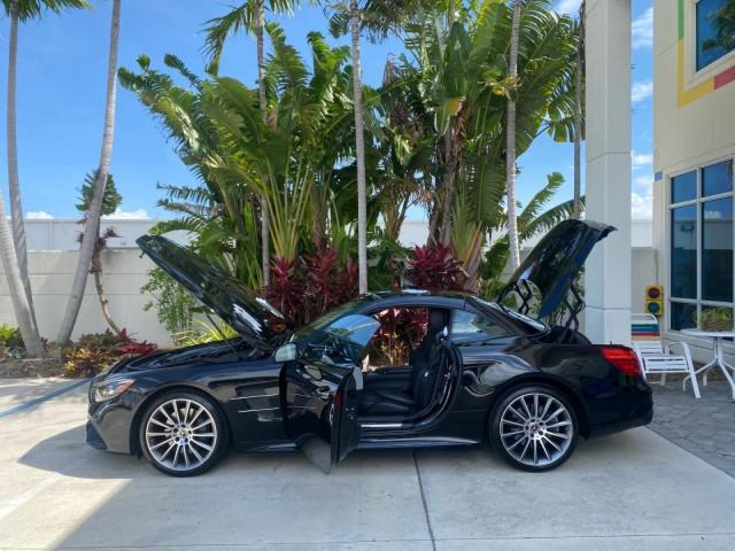 2020 Black /Black Mercedes-Benz SL 450 1 OWNER LOW MILES 18,591 (W1KJK6GA6LF) with an 3.0L Bi-Turbo V6 Engine engine, Automatic transmission, located at 4701 North Dixie Hwy, Pompano Beach, FL, 33064, (954) 422-2889, 26.240938, -80.123474 - OUR WEBPAGE FLORIDACARS1.COM HAS OVER 100 PHOTOS AND FREE CARFAX LINK 2020 MERCEDES-BENZ SL-CLASS SL 450 VIN: W1KJK6GA6LF060243 W 1 K J K 6 G A 6 L F 0 6 0 2 4 3 CONVERTIBLE HARD TOP 3.0L V6 GASOLINE REAR WHEEL DRIVE Highlighted Features AMG PACKAGE HARD TOP RETRACTABLE WITH SUNROOF AMBIENT LIGHTING - Photo#8