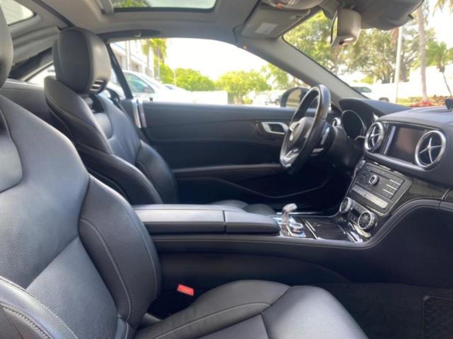 2020 Black /Black Mercedes-Benz SL 450 1 OWNER LOW MILES 18,591 (W1KJK6GA6LF) with an 3.0L Bi-Turbo V6 Engine engine, Automatic transmission, located at 4701 North Dixie Hwy, Pompano Beach, FL, 33064, (954) 422-2889, 26.240938, -80.123474 - OUR WEBPAGE FLORIDACARS1.COM HAS OVER 100 PHOTOS AND FREE CARFAX LINK 2020 MERCEDES-BENZ SL-CLASS SL 450 VIN: W1KJK6GA6LF060243 W 1 K J K 6 G A 6 L F 0 6 0 2 4 3 CONVERTIBLE HARD TOP 3.0L V6 GASOLINE REAR WHEEL DRIVE Highlighted Features AMG PACKAGE HARD TOP RETRACTABLE WITH SUNROOF AMBIENT LIGHTING - Photo#99