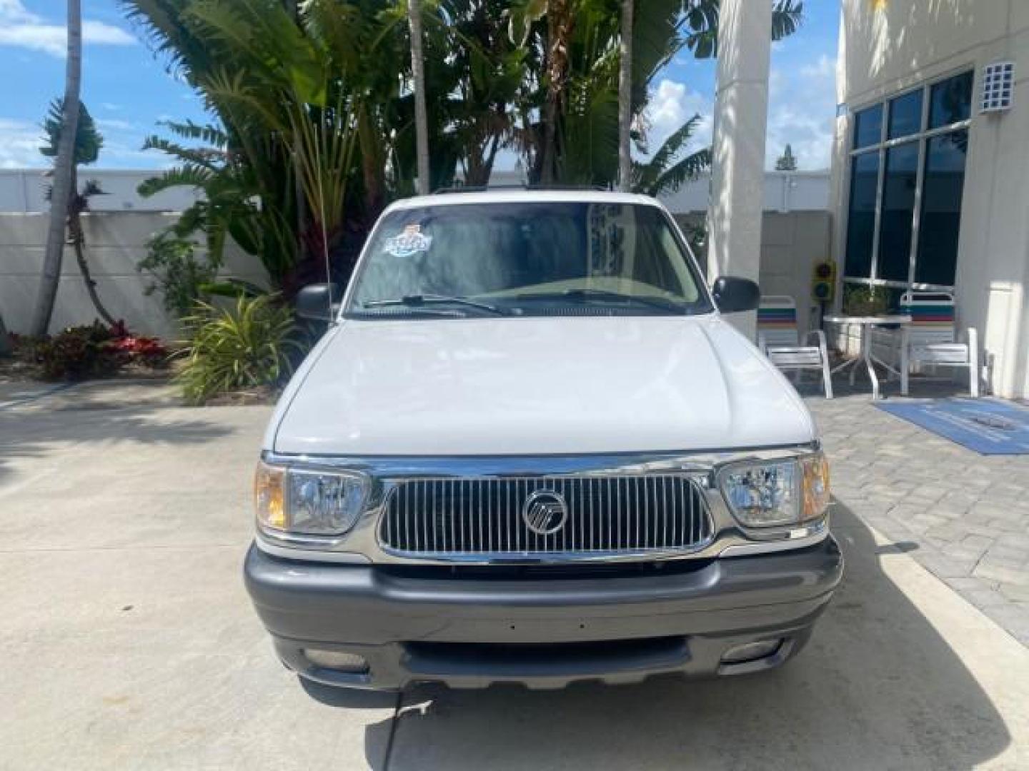 1999 Oxford White /Prairie Tan Mercury Mountaineer 1 OWNER FL LOW MILES (4M2DU52P6XU) with an 5.0L SEFI V8 Engine engine, Automatic transmission, located at 4701 North Dixie Hwy, Pompano Beach, FL, 33064, (954) 422-2889, 26.240938, -80.123474 - OUR WEBPAGE FLORIDACARS1.COM HAS OVER 100 PHOTOS AND FREE CARFAX LINK 1999 MERCURY MOUNTAINEER VIN: 4M2DU52P6XUJ01084 4 M 2 D U 5 2 P 6 X U J 0 1 0 8 4 4 DOOR WAGON/SPORT UTILITY WE ORDERED A NEW GLOVE BOX COVER 5.0L V8 F GASOLINE REAR WHEEL DRIVE Top Features Alloy Wheels Leather Seats Running Boar - Photo#2