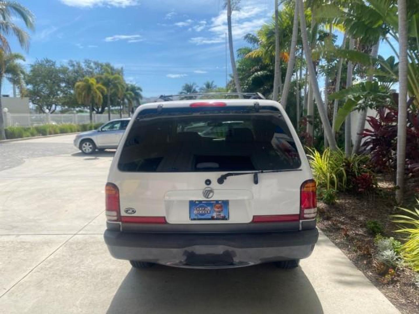 1999 Oxford White /Prairie Tan Mercury Mountaineer 1 OWNER FL LOW MILES (4M2DU52P6XU) with an 5.0L SEFI V8 Engine engine, Automatic transmission, located at 4701 North Dixie Hwy, Pompano Beach, FL, 33064, (954) 422-2889, 26.240938, -80.123474 - OUR WEBPAGE FLORIDACARS1.COM HAS OVER 100 PHOTOS AND FREE CARFAX LINK 1999 MERCURY MOUNTAINEER VIN: 4M2DU52P6XUJ01084 4 M 2 D U 5 2 P 6 X U J 0 1 0 8 4 4 DOOR WAGON/SPORT UTILITY WE ORDERED A NEW GLOVE BOX COVER 5.0L V8 F GASOLINE REAR WHEEL DRIVE Top Features Alloy Wheels Leather Seats Running Boar - Photo#6