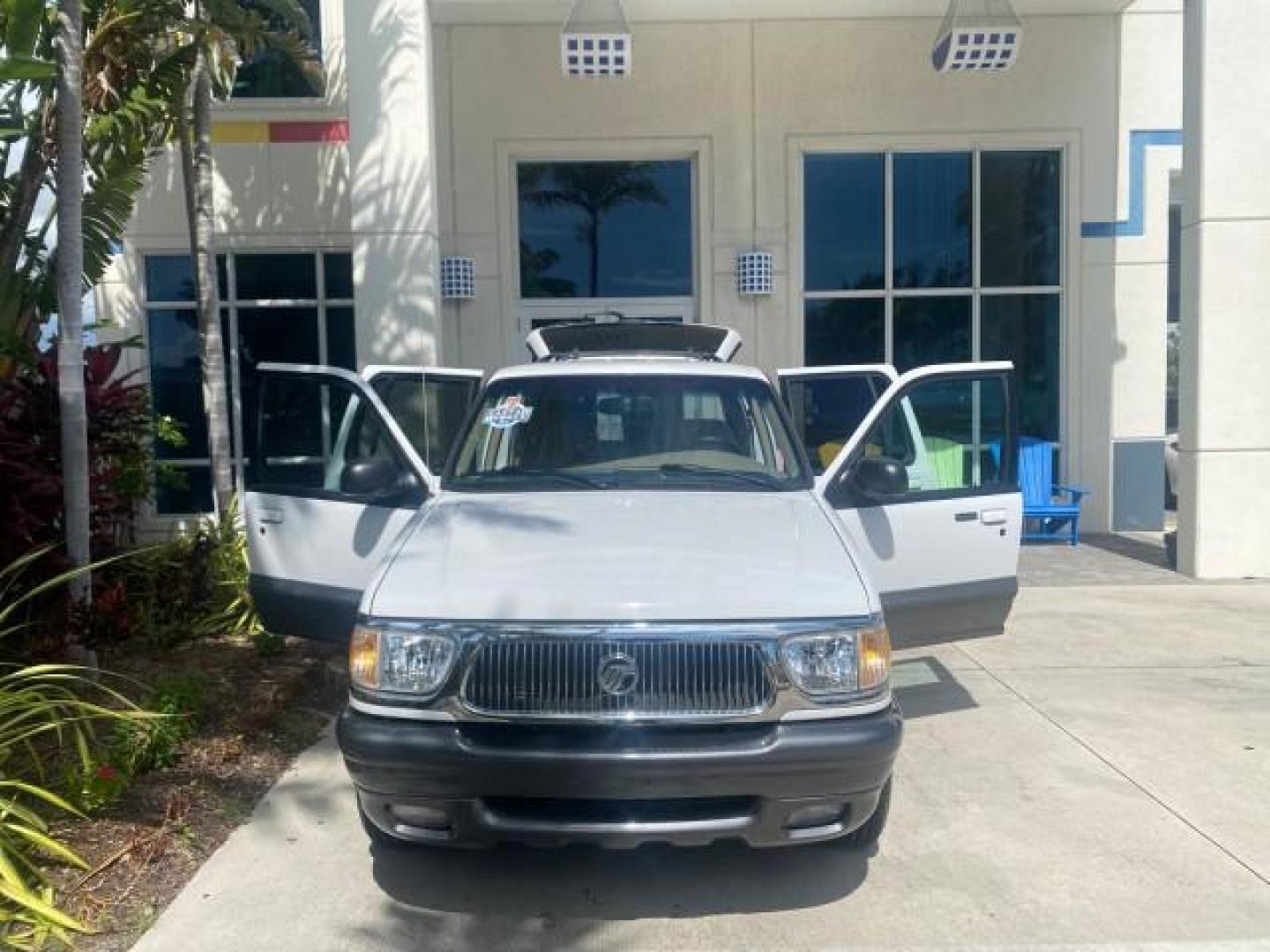 1999 Oxford White /Prairie Tan Mercury Mountaineer 1 OWNER FL LOW MILES (4M2DU52P6XU) with an 5.0L SEFI V8 Engine engine, Automatic transmission, located at 4701 North Dixie Hwy, Pompano Beach, FL, 33064, (954) 422-2889, 26.240938, -80.123474 - OUR WEBPAGE FLORIDACARS1.COM HAS OVER 100 PHOTOS AND FREE CARFAX LINK 1999 MERCURY MOUNTAINEER VIN: 4M2DU52P6XUJ01084 4 M 2 D U 5 2 P 6 X U J 0 1 0 8 4 4 DOOR WAGON/SPORT UTILITY WE ORDERED A NEW GLOVE BOX COVER 5.0L V8 F GASOLINE REAR WHEEL DRIVE Top Features Alloy Wheels Leather Seats Running Boar - Photo#16