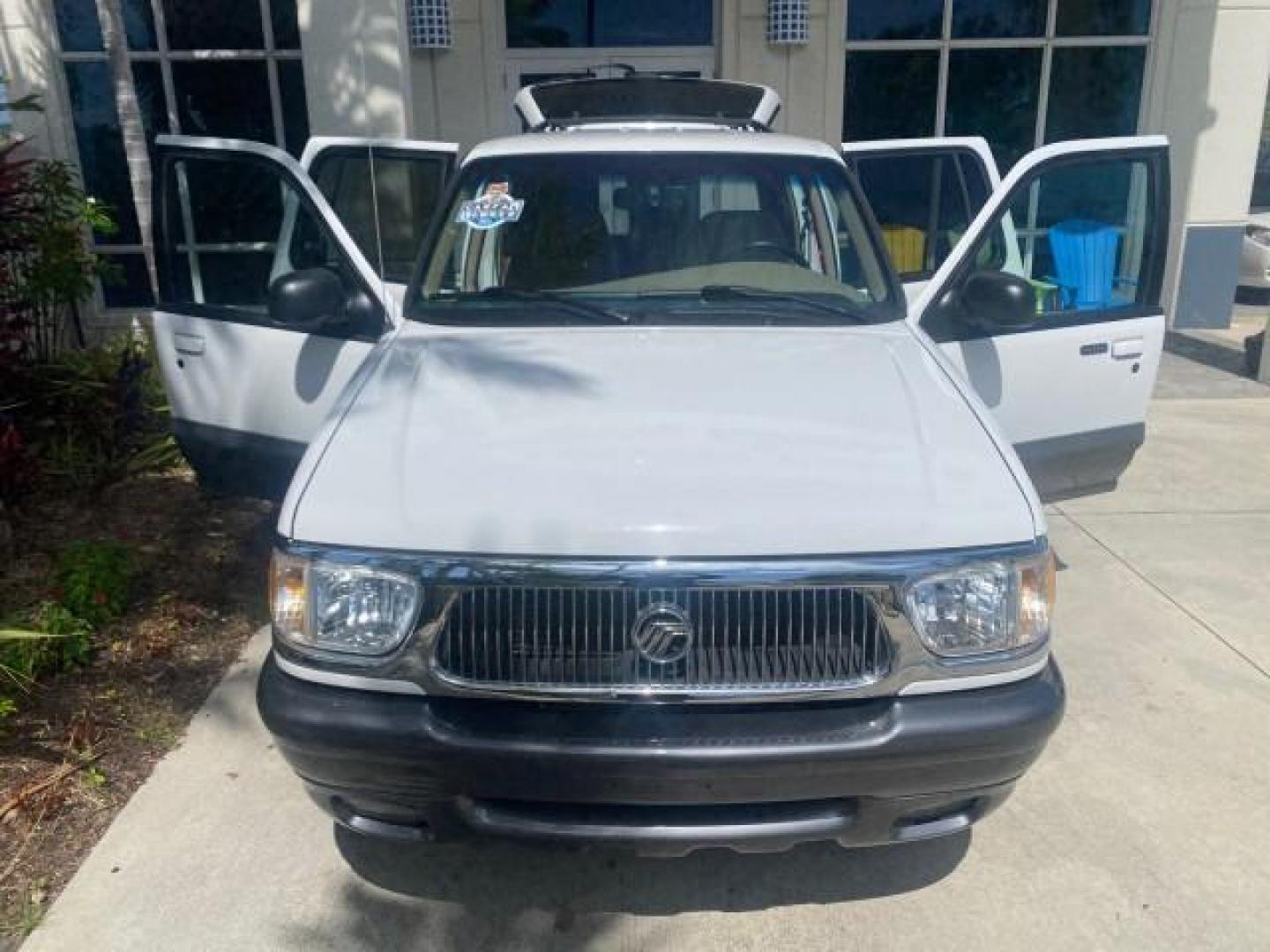 1999 Oxford White /Prairie Tan Mercury Mountaineer 1 OWNER FL LOW MILES (4M2DU52P6XU) with an 5.0L SEFI V8 Engine engine, Automatic transmission, located at 4701 North Dixie Hwy, Pompano Beach, FL, 33064, (954) 422-2889, 26.240938, -80.123474 - OUR WEBPAGE FLORIDACARS1.COM HAS OVER 100 PHOTOS AND FREE CARFAX LINK 1999 MERCURY MOUNTAINEER VIN: 4M2DU52P6XUJ01084 4 M 2 D U 5 2 P 6 X U J 0 1 0 8 4 4 DOOR WAGON/SPORT UTILITY WE ORDERED A NEW GLOVE BOX COVER 5.0L V8 F GASOLINE REAR WHEEL DRIVE Top Features Alloy Wheels Leather Seats Running Boar - Photo#17