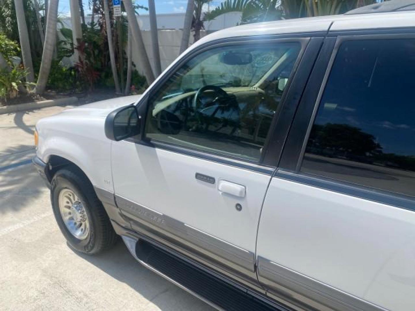 1999 Oxford White /Prairie Tan Mercury Mountaineer 1 OWNER FL LOW MILES (4M2DU52P6XU) with an 5.0L SEFI V8 Engine engine, Automatic transmission, located at 4701 North Dixie Hwy, Pompano Beach, FL, 33064, (954) 422-2889, 26.240938, -80.123474 - OUR WEBPAGE FLORIDACARS1.COM HAS OVER 100 PHOTOS AND FREE CARFAX LINK 1999 MERCURY MOUNTAINEER VIN: 4M2DU52P6XUJ01084 4 M 2 D U 5 2 P 6 X U J 0 1 0 8 4 4 DOOR WAGON/SPORT UTILITY WE ORDERED A NEW GLOVE BOX COVER 5.0L V8 F GASOLINE REAR WHEEL DRIVE Top Features Alloy Wheels Leather Seats Running Boar - Photo#27