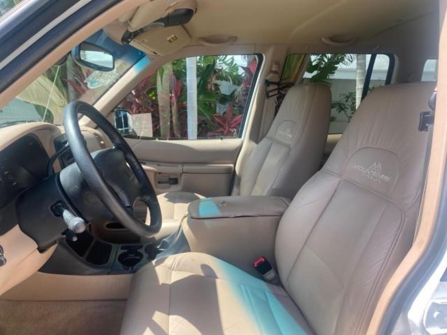 1999 Oxford White /Prairie Tan Mercury Mountaineer 1 OWNER FL LOW MILES (4M2DU52P6XU) with an 5.0L SEFI V8 Engine engine, Automatic transmission, located at 4701 North Dixie Hwy, Pompano Beach, FL, 33064, (954) 422-2889, 26.240938, -80.123474 - OUR WEBPAGE FLORIDACARS1.COM HAS OVER 100 PHOTOS AND FREE CARFAX LINK 1999 MERCURY MOUNTAINEER VIN: 4M2DU52P6XUJ01084 4 M 2 D U 5 2 P 6 X U J 0 1 0 8 4 4 DOOR WAGON/SPORT UTILITY WE ORDERED A NEW GLOVE BOX COVER 5.0L V8 F GASOLINE REAR WHEEL DRIVE Top Features Alloy Wheels Leather Seats Running Boar - Photo#36