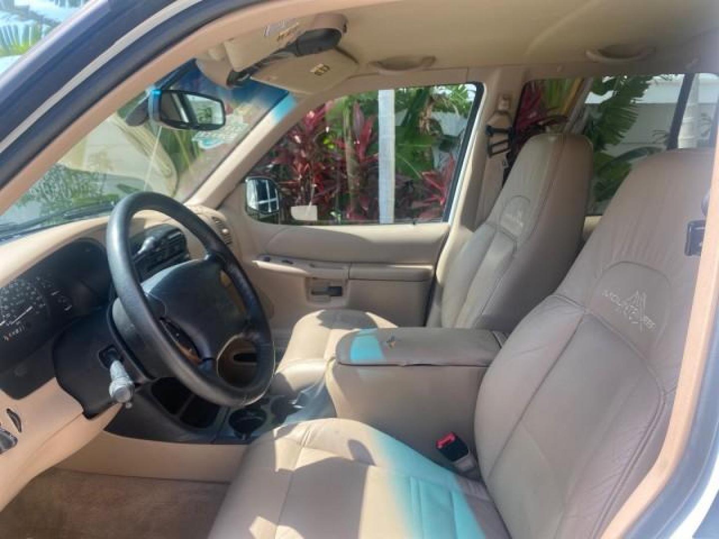 1999 Oxford White /Prairie Tan Mercury Mountaineer 1 OWNER FL LOW MILES (4M2DU52P6XU) with an 5.0L SEFI V8 Engine engine, Automatic transmission, located at 4701 North Dixie Hwy, Pompano Beach, FL, 33064, (954) 422-2889, 26.240938, -80.123474 - OUR WEBPAGE FLORIDACARS1.COM HAS OVER 100 PHOTOS AND FREE CARFAX LINK 1999 MERCURY MOUNTAINEER VIN: 4M2DU52P6XUJ01084 4 M 2 D U 5 2 P 6 X U J 0 1 0 8 4 4 DOOR WAGON/SPORT UTILITY WE ORDERED A NEW GLOVE BOX COVER 5.0L V8 F GASOLINE REAR WHEEL DRIVE Top Features Alloy Wheels Leather Seats Running Boar - Photo#37