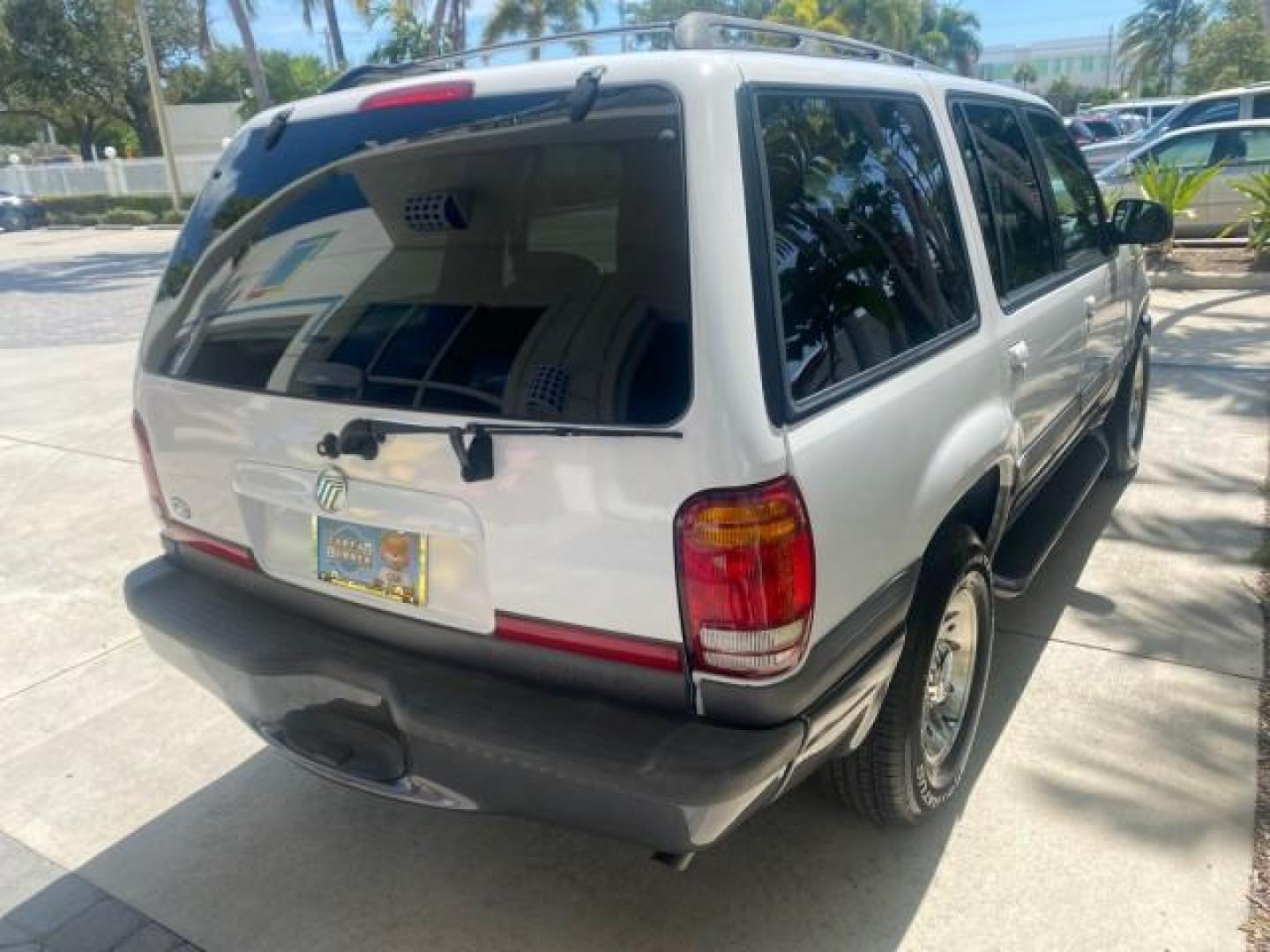 1999 Oxford White /Prairie Tan Mercury Mountaineer 1 OWNER FL LOW MILES (4M2DU52P6XU) with an 5.0L SEFI V8 Engine engine, Automatic transmission, located at 4701 North Dixie Hwy, Pompano Beach, FL, 33064, (954) 422-2889, 26.240938, -80.123474 - OUR WEBPAGE FLORIDACARS1.COM HAS OVER 100 PHOTOS AND FREE CARFAX LINK 1999 MERCURY MOUNTAINEER VIN: 4M2DU52P6XUJ01084 4 M 2 D U 5 2 P 6 X U J 0 1 0 8 4 4 DOOR WAGON/SPORT UTILITY WE ORDERED A NEW GLOVE BOX COVER 5.0L V8 F GASOLINE REAR WHEEL DRIVE Top Features Alloy Wheels Leather Seats Running Boar - Photo#80