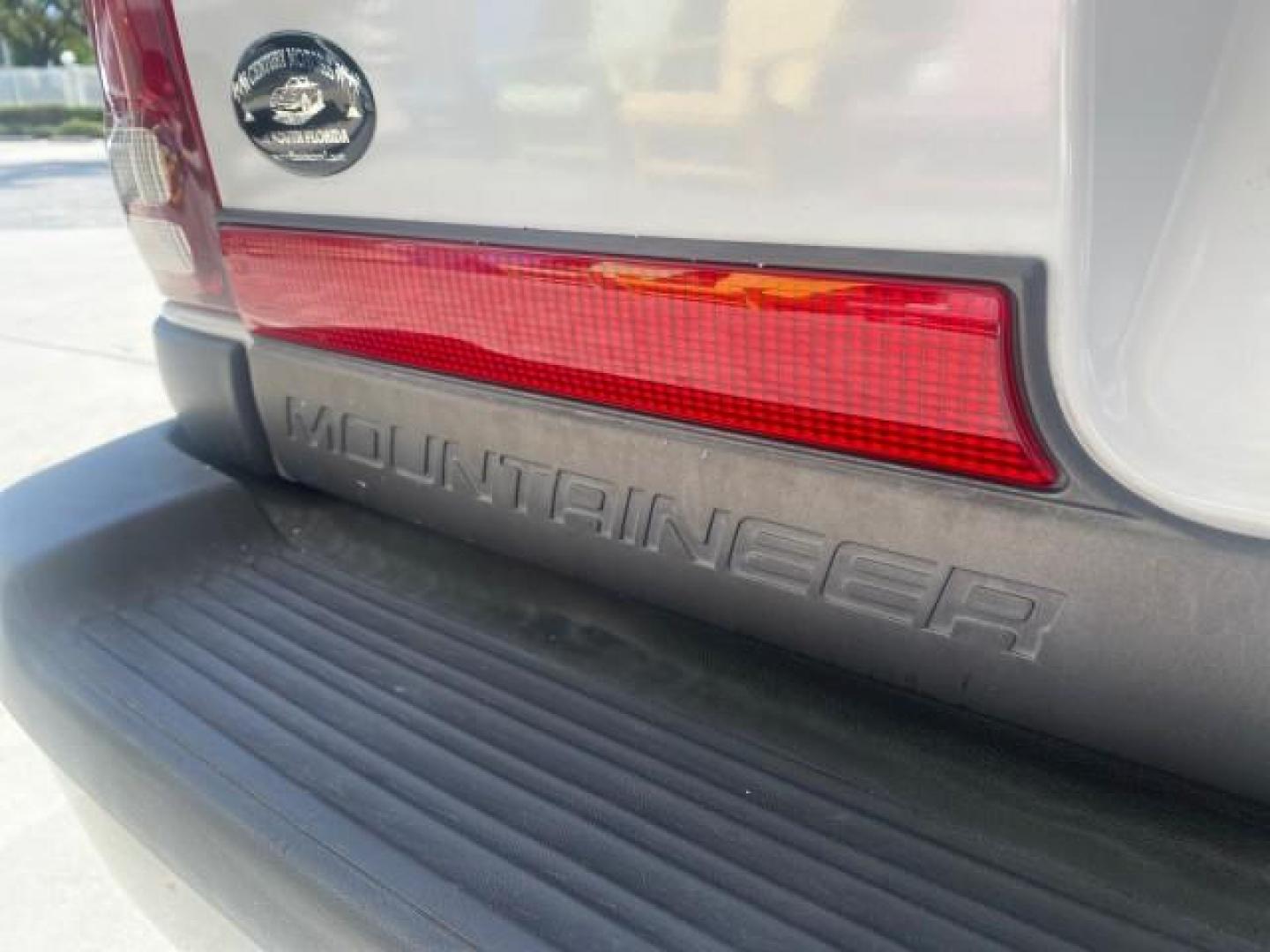 1999 Oxford White /Prairie Tan Mercury Mountaineer 1 OWNER FL LOW MILES (4M2DU52P6XU) with an 5.0L SEFI V8 Engine engine, Automatic transmission, located at 4701 North Dixie Hwy, Pompano Beach, FL, 33064, (954) 422-2889, 26.240938, -80.123474 - OUR WEBPAGE FLORIDACARS1.COM HAS OVER 100 PHOTOS AND FREE CARFAX LINK 1999 MERCURY MOUNTAINEER VIN: 4M2DU52P6XUJ01084 4 M 2 D U 5 2 P 6 X U J 0 1 0 8 4 4 DOOR WAGON/SPORT UTILITY WE ORDERED A NEW GLOVE BOX COVER 5.0L V8 F GASOLINE REAR WHEEL DRIVE Top Features Alloy Wheels Leather Seats Running Boar - Photo#81