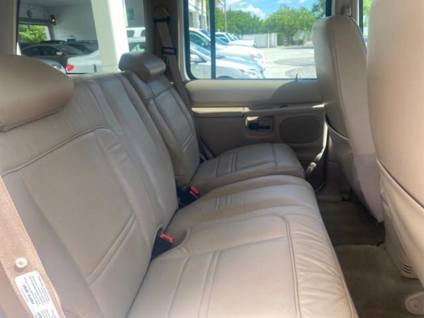 1999 Oxford White /Prairie Tan Mercury Mountaineer 1 OWNER FL LOW MILES (4M2DU52P6XU) with an 5.0L SEFI V8 Engine engine, Automatic transmission, located at 4701 North Dixie Hwy, Pompano Beach, FL, 33064, (954) 422-2889, 26.240938, -80.123474 - OUR WEBPAGE FLORIDACARS1.COM HAS OVER 100 PHOTOS AND FREE CARFAX LINK 1999 MERCURY MOUNTAINEER VIN: 4M2DU52P6XUJ01084 4 M 2 D U 5 2 P 6 X U J 0 1 0 8 4 4 DOOR WAGON/SPORT UTILITY WE ORDERED A NEW GLOVE BOX COVER 5.0L V8 F GASOLINE REAR WHEEL DRIVE Top Features Alloy Wheels Leather Seats Running Boar - Photo#94