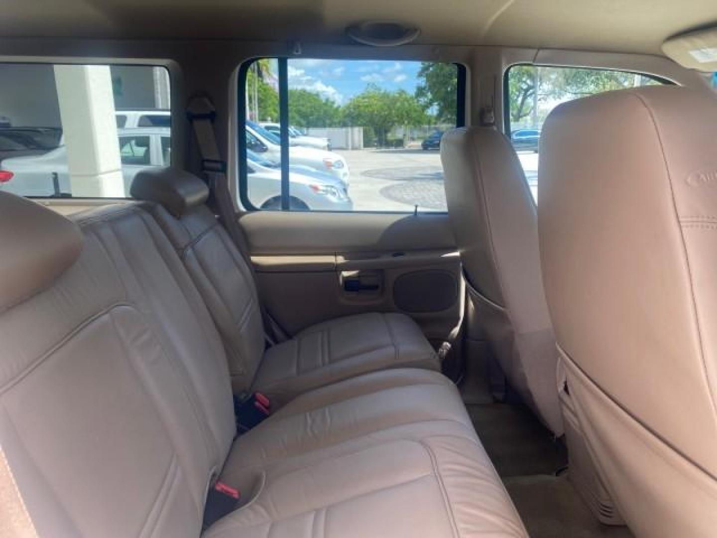 1999 Oxford White /Prairie Tan Mercury Mountaineer 1 OWNER FL LOW MILES (4M2DU52P6XU) with an 5.0L SEFI V8 Engine engine, Automatic transmission, located at 4701 North Dixie Hwy, Pompano Beach, FL, 33064, (954) 422-2889, 26.240938, -80.123474 - OUR WEBPAGE FLORIDACARS1.COM HAS OVER 100 PHOTOS AND FREE CARFAX LINK 1999 MERCURY MOUNTAINEER VIN: 4M2DU52P6XUJ01084 4 M 2 D U 5 2 P 6 X U J 0 1 0 8 4 4 DOOR WAGON/SPORT UTILITY WE ORDERED A NEW GLOVE BOX COVER 5.0L V8 F GASOLINE REAR WHEEL DRIVE Top Features Alloy Wheels Leather Seats Running Boar - Photo#95