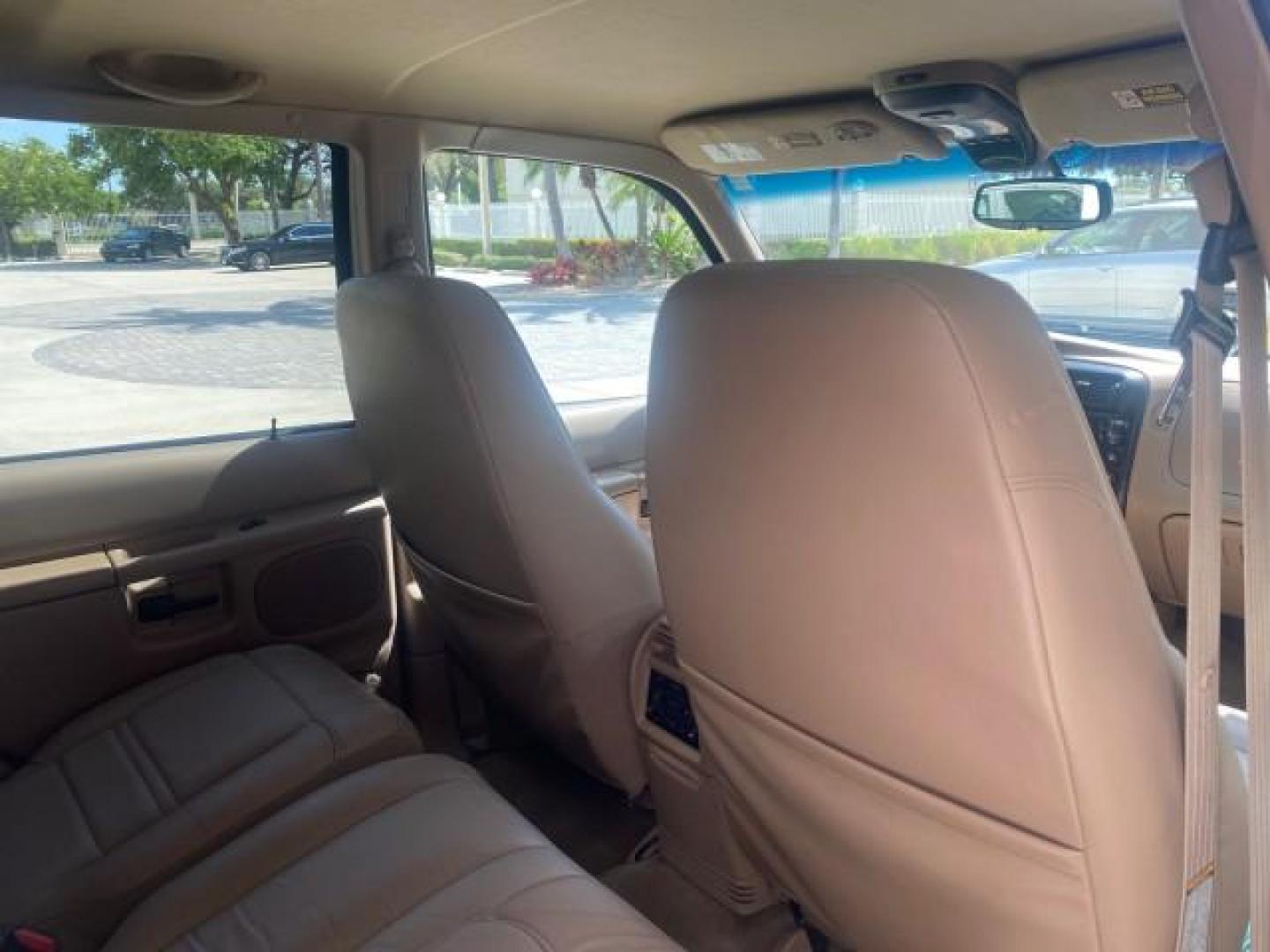 1999 Oxford White /Prairie Tan Mercury Mountaineer 1 OWNER FL LOW MILES (4M2DU52P6XU) with an 5.0L SEFI V8 Engine engine, Automatic transmission, located at 4701 North Dixie Hwy, Pompano Beach, FL, 33064, (954) 422-2889, 26.240938, -80.123474 - OUR WEBPAGE FLORIDACARS1.COM HAS OVER 100 PHOTOS AND FREE CARFAX LINK 1999 MERCURY MOUNTAINEER VIN: 4M2DU52P6XUJ01084 4 M 2 D U 5 2 P 6 X U J 0 1 0 8 4 4 DOOR WAGON/SPORT UTILITY WE ORDERED A NEW GLOVE BOX COVER 5.0L V8 F GASOLINE REAR WHEEL DRIVE Top Features Alloy Wheels Leather Seats Running Boar - Photo#97