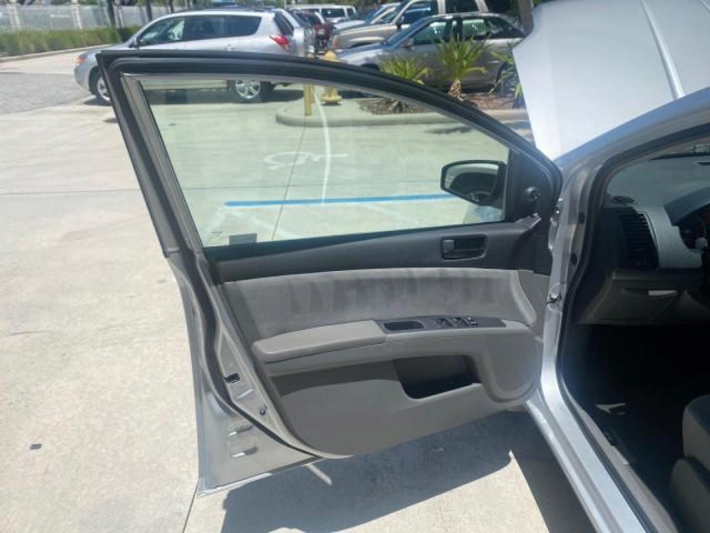 2009 Fresh Powder /Beige Nissan Sentra 2.0 SL 1 OWNER LOW MILES 37,645 (3N1AB61EX9L) with an 2.0L DOHC 16-Valve SMPI I4 Engine engine, Automatic transmission, located at 4701 North Dixie Hwy, Pompano Beach, FL, 33064, (954) 422-2889, 26.240938, -80.123474 - OUR WEBPAGE FLORIDACARS1.COM HAS OVER 100 PHOTOS AND FREE CARFAX LINK 2009 NISSAN SENTRA 2.0 30 MPG VIN: 3N1AB61EX9L688751 3 N 1 A B 6 1 E X 9 L 6 8 8 7 5 1 SEDAN 4 DR 2.0L I4 F DOHC 16V GASOLINE FRONT WHEEL DRIVE Top Features Cloth Seats Basic Features ABS Brakes AM/FM Stereo Air Conditioning Autom - Photo#9
