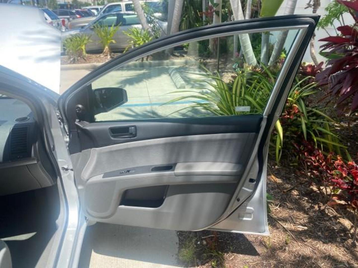 2009 Fresh Powder /Beige Nissan Sentra 2.0 SL 1 OWNER LOW MILES 37,645 (3N1AB61EX9L) with an 2.0L DOHC 16-Valve SMPI I4 Engine engine, Automatic transmission, located at 4701 North Dixie Hwy, Pompano Beach, FL, 33064, (954) 422-2889, 26.240938, -80.123474 - OUR WEBPAGE FLORIDACARS1.COM HAS OVER 100 PHOTOS AND FREE CARFAX LINK 2009 NISSAN SENTRA 2.0 30 MPG VIN: 3N1AB61EX9L688751 3 N 1 A B 6 1 E X 9 L 6 8 8 7 5 1 SEDAN 4 DR 2.0L I4 F DOHC 16V GASOLINE FRONT WHEEL DRIVE Top Features Cloth Seats Basic Features ABS Brakes AM/FM Stereo Air Conditioning Autom - Photo#11