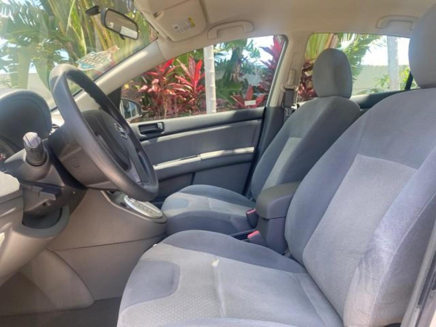 2009 Fresh Powder /Beige Nissan Sentra 2.0 SL 1 OWNER LOW MILES 37,645 (3N1AB61EX9L) with an 2.0L DOHC 16-Valve SMPI I4 Engine engine, Automatic transmission, located at 4701 North Dixie Hwy, Pompano Beach, FL, 33064, (954) 422-2889, 26.240938, -80.123474 - OUR WEBPAGE FLORIDACARS1.COM HAS OVER 100 PHOTOS AND FREE CARFAX LINK 2009 NISSAN SENTRA 2.0 30 MPG VIN: 3N1AB61EX9L688751 3 N 1 A B 6 1 E X 9 L 6 8 8 7 5 1 SEDAN 4 DR 2.0L I4 F DOHC 16V GASOLINE FRONT WHEEL DRIVE Top Features Cloth Seats Basic Features ABS Brakes AM/FM Stereo Air Conditioning Autom - Photo#33