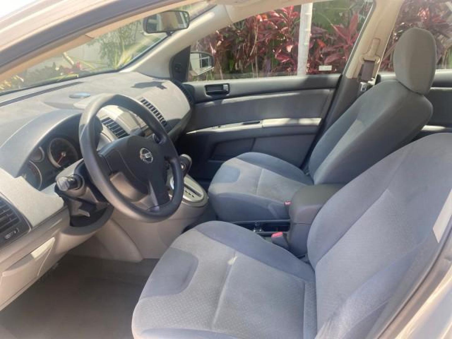 2009 Fresh Powder /Beige Nissan Sentra 2.0 SL 1 OWNER LOW MILES 37,645 (3N1AB61EX9L) with an 2.0L DOHC 16-Valve SMPI I4 Engine engine, Automatic transmission, located at 4701 North Dixie Hwy, Pompano Beach, FL, 33064, (954) 422-2889, 26.240938, -80.123474 - OUR WEBPAGE FLORIDACARS1.COM HAS OVER 100 PHOTOS AND FREE CARFAX LINK 2009 NISSAN SENTRA 2.0 30 MPG VIN: 3N1AB61EX9L688751 3 N 1 A B 6 1 E X 9 L 6 8 8 7 5 1 SEDAN 4 DR 2.0L I4 F DOHC 16V GASOLINE FRONT WHEEL DRIVE Top Features Cloth Seats Basic Features ABS Brakes AM/FM Stereo Air Conditioning Autom - Photo#34