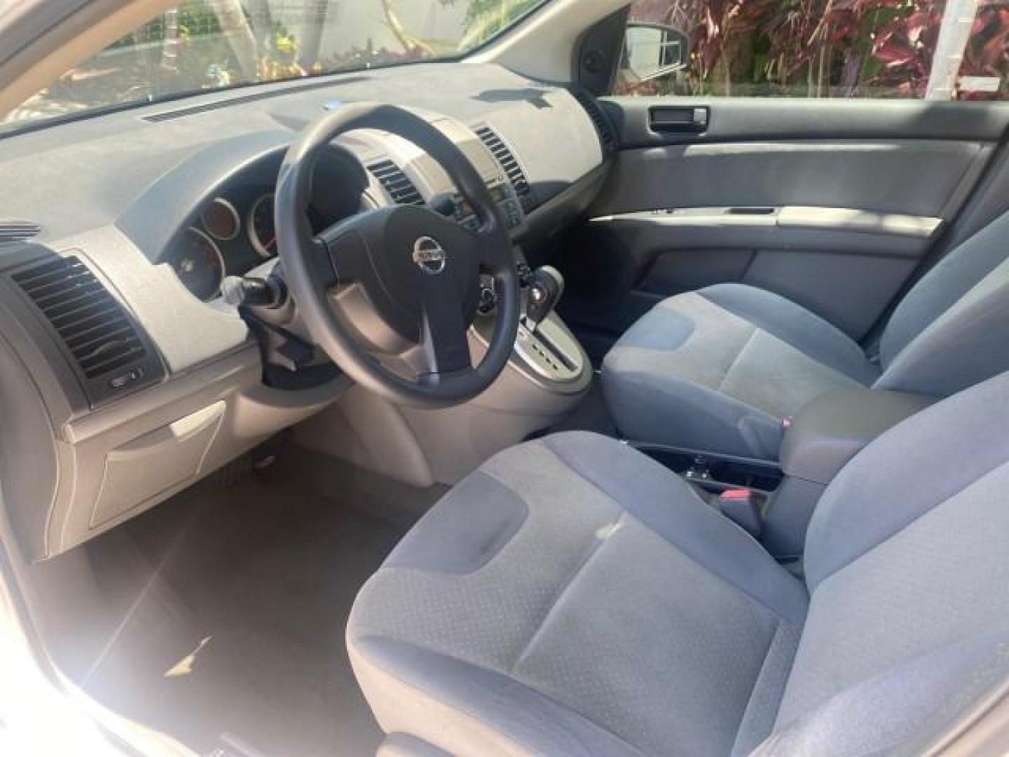 2009 Fresh Powder /Beige Nissan Sentra 2.0 SL 1 OWNER LOW MILES 37,645 (3N1AB61EX9L) with an 2.0L DOHC 16-Valve SMPI I4 Engine engine, Automatic transmission, located at 4701 North Dixie Hwy, Pompano Beach, FL, 33064, (954) 422-2889, 26.240938, -80.123474 - OUR WEBPAGE FLORIDACARS1.COM HAS OVER 100 PHOTOS AND FREE CARFAX LINK 2009 NISSAN SENTRA 2.0 30 MPG VIN: 3N1AB61EX9L688751 3 N 1 A B 6 1 E X 9 L 6 8 8 7 5 1 SEDAN 4 DR 2.0L I4 F DOHC 16V GASOLINE FRONT WHEEL DRIVE Top Features Cloth Seats Basic Features ABS Brakes AM/FM Stereo Air Conditioning Autom - Photo#35