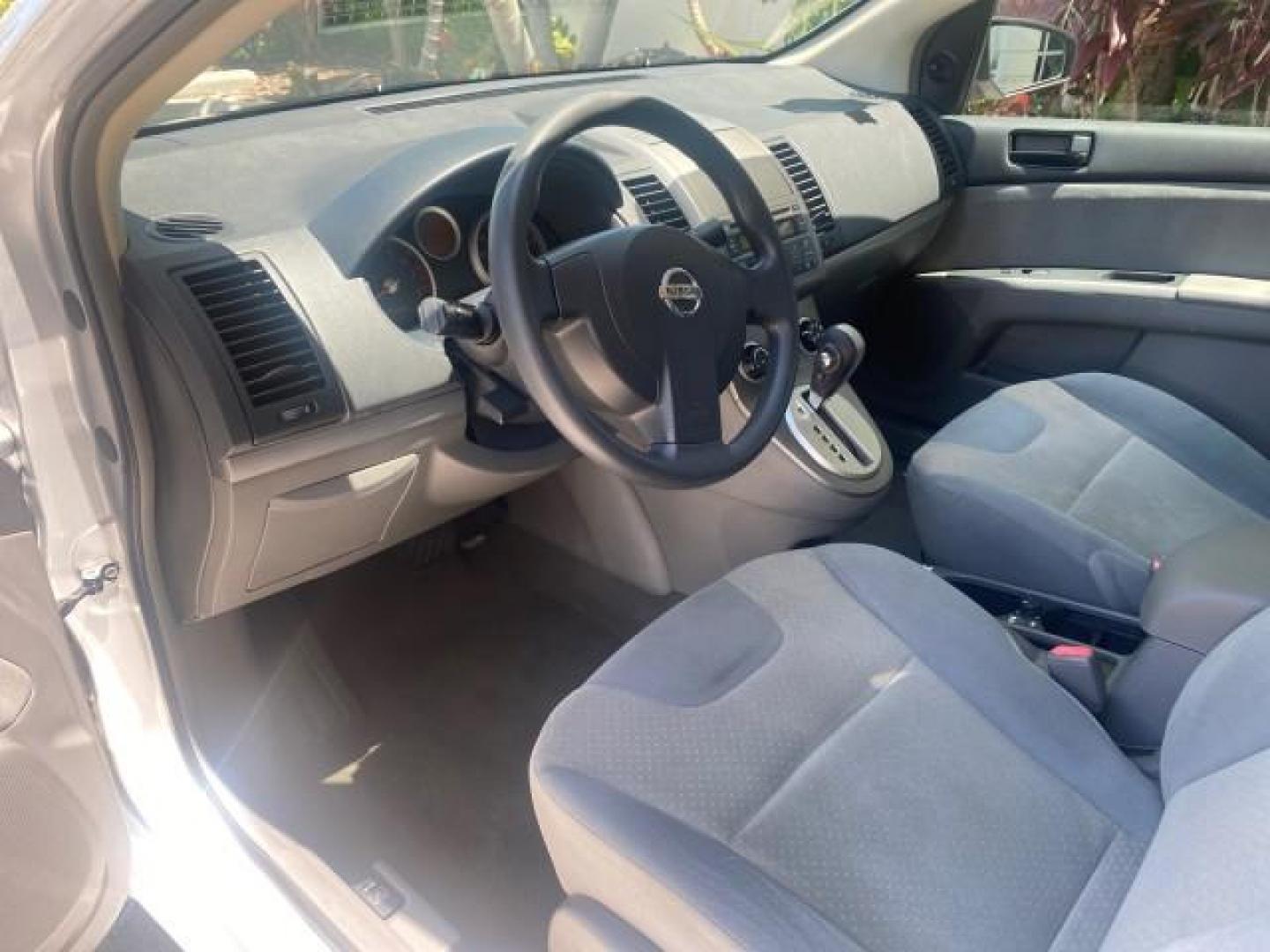 2009 Fresh Powder /Beige Nissan Sentra 2.0 SL 1 OWNER LOW MILES 37,645 (3N1AB61EX9L) with an 2.0L DOHC 16-Valve SMPI I4 Engine engine, Automatic transmission, located at 4701 North Dixie Hwy, Pompano Beach, FL, 33064, (954) 422-2889, 26.240938, -80.123474 - OUR WEBPAGE FLORIDACARS1.COM HAS OVER 100 PHOTOS AND FREE CARFAX LINK 2009 NISSAN SENTRA 2.0 30 MPG VIN: 3N1AB61EX9L688751 3 N 1 A B 6 1 E X 9 L 6 8 8 7 5 1 SEDAN 4 DR 2.0L I4 F DOHC 16V GASOLINE FRONT WHEEL DRIVE Top Features Cloth Seats Basic Features ABS Brakes AM/FM Stereo Air Conditioning Autom - Photo#36