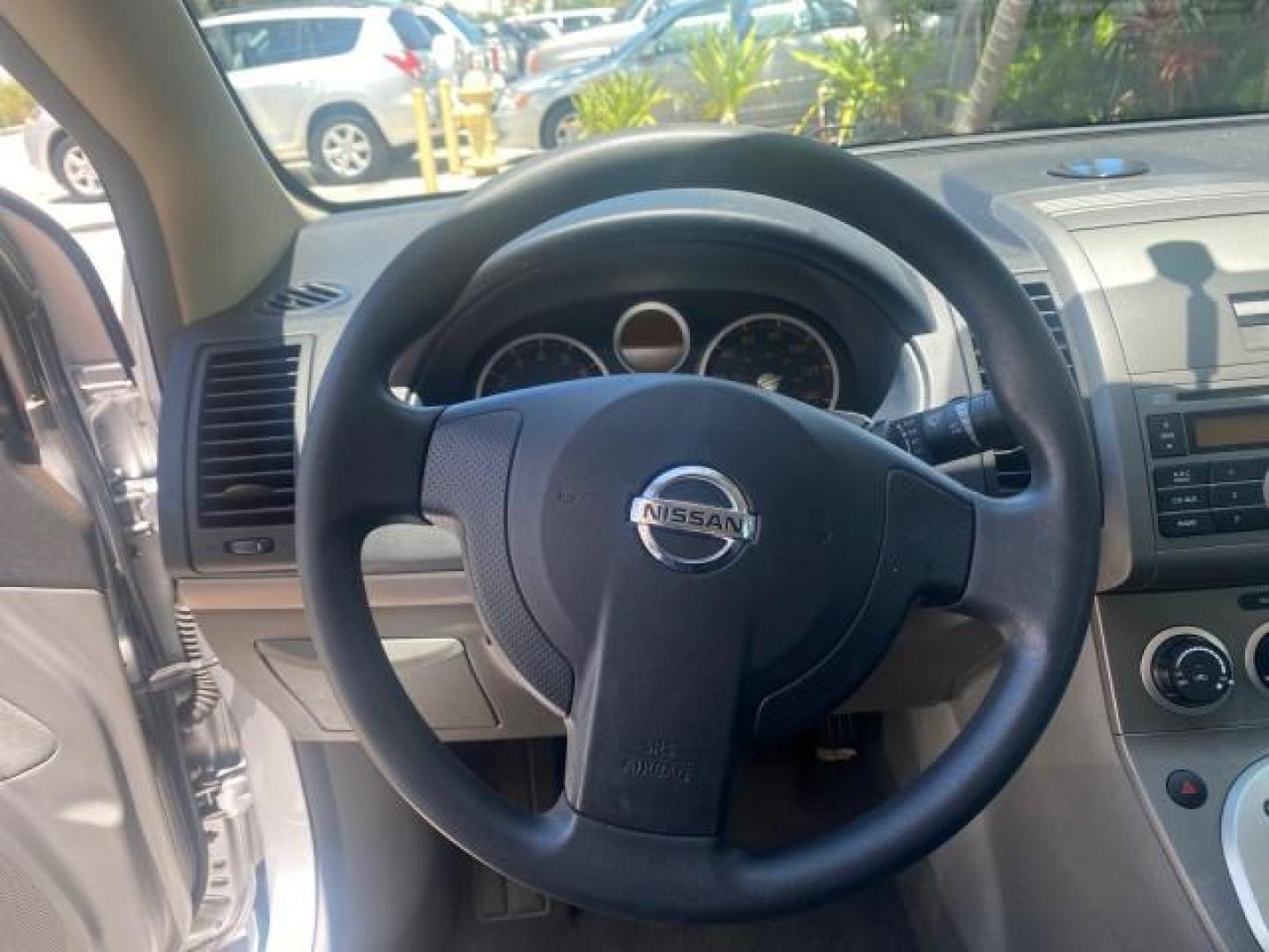 2009 Fresh Powder /Beige Nissan Sentra 2.0 SL 1 OWNER LOW MILES 37,645 (3N1AB61EX9L) with an 2.0L DOHC 16-Valve SMPI I4 Engine engine, Automatic transmission, located at 4701 North Dixie Hwy, Pompano Beach, FL, 33064, (954) 422-2889, 26.240938, -80.123474 - OUR WEBPAGE FLORIDACARS1.COM HAS OVER 100 PHOTOS AND FREE CARFAX LINK 2009 NISSAN SENTRA 2.0 30 MPG VIN: 3N1AB61EX9L688751 3 N 1 A B 6 1 E X 9 L 6 8 8 7 5 1 SEDAN 4 DR 2.0L I4 F DOHC 16V GASOLINE FRONT WHEEL DRIVE Top Features Cloth Seats Basic Features ABS Brakes AM/FM Stereo Air Conditioning Autom - Photo#38
