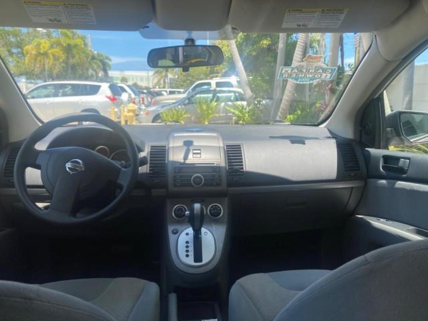 2009 Fresh Powder /Beige Nissan Sentra 2.0 SL 1 OWNER LOW MILES 37,645 (3N1AB61EX9L) with an 2.0L DOHC 16-Valve SMPI I4 Engine engine, Automatic transmission, located at 4701 North Dixie Hwy, Pompano Beach, FL, 33064, (954) 422-2889, 26.240938, -80.123474 - OUR WEBPAGE FLORIDACARS1.COM HAS OVER 100 PHOTOS AND FREE CARFAX LINK 2009 NISSAN SENTRA 2.0 30 MPG VIN: 3N1AB61EX9L688751 3 N 1 A B 6 1 E X 9 L 6 8 8 7 5 1 SEDAN 4 DR 2.0L I4 F DOHC 16V GASOLINE FRONT WHEEL DRIVE Top Features Cloth Seats Basic Features ABS Brakes AM/FM Stereo Air Conditioning Autom - Photo#66