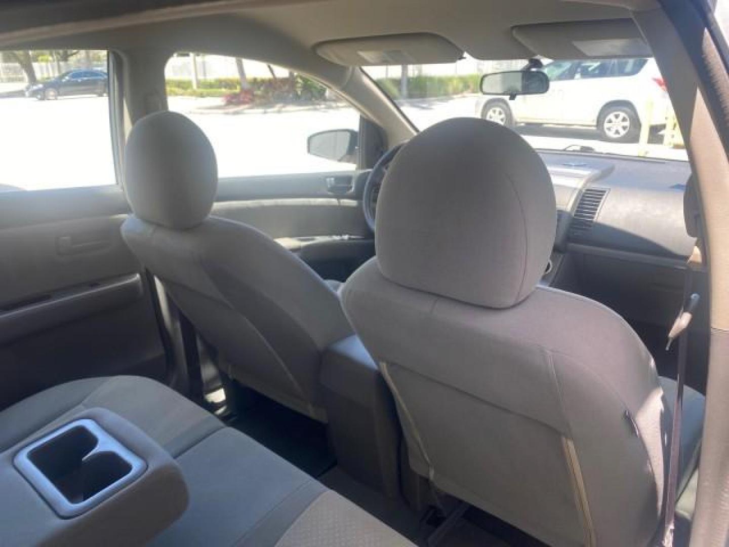 2009 Fresh Powder /Beige Nissan Sentra 2.0 SL 1 OWNER LOW MILES 37,645 (3N1AB61EX9L) with an 2.0L DOHC 16-Valve SMPI I4 Engine engine, Automatic transmission, located at 4701 North Dixie Hwy, Pompano Beach, FL, 33064, (954) 422-2889, 26.240938, -80.123474 - OUR WEBPAGE FLORIDACARS1.COM HAS OVER 100 PHOTOS AND FREE CARFAX LINK 2009 NISSAN SENTRA 2.0 30 MPG VIN: 3N1AB61EX9L688751 3 N 1 A B 6 1 E X 9 L 6 8 8 7 5 1 SEDAN 4 DR 2.0L I4 F DOHC 16V GASOLINE FRONT WHEEL DRIVE Top Features Cloth Seats Basic Features ABS Brakes AM/FM Stereo Air Conditioning Autom - Photo#91