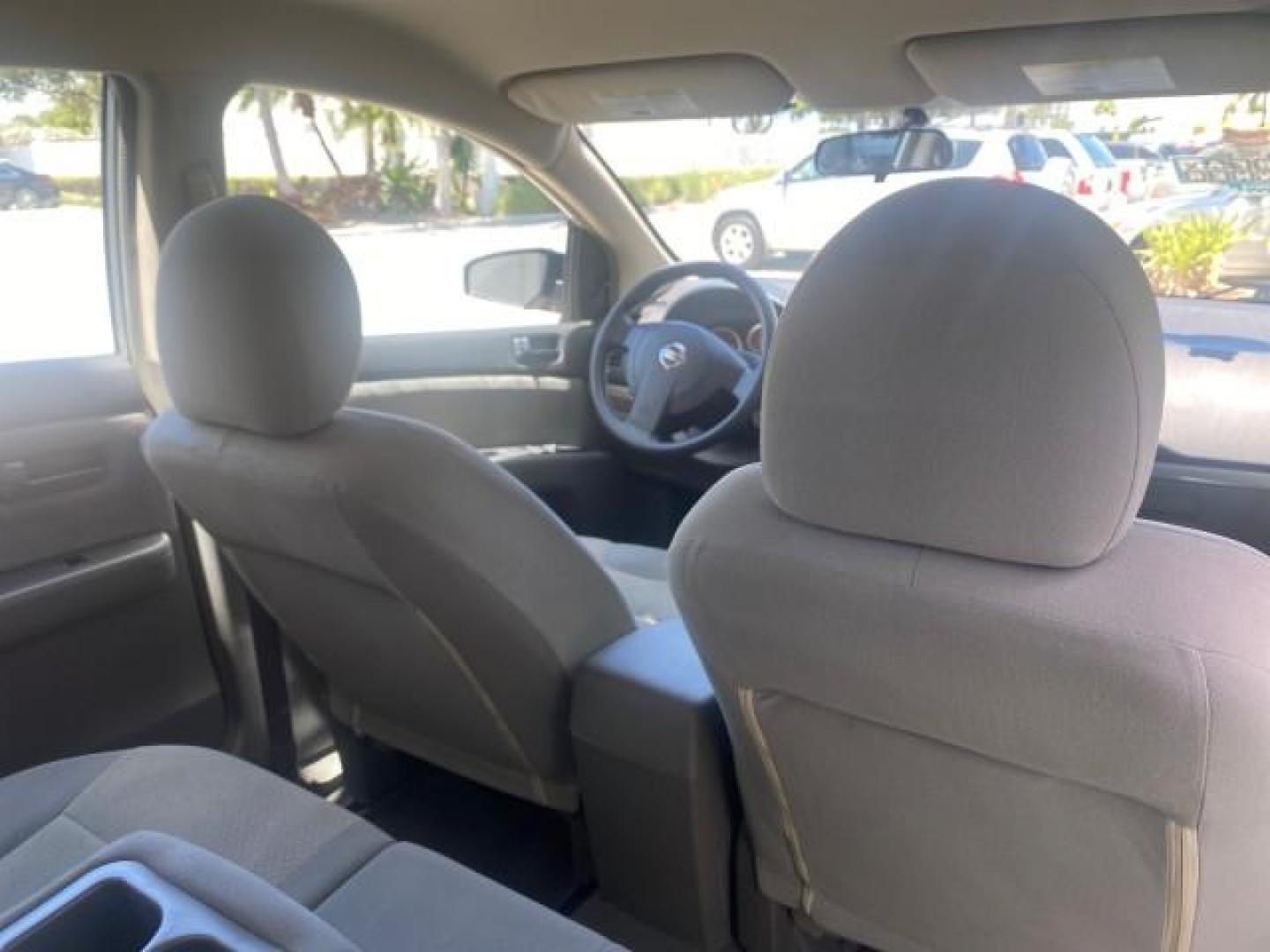 2009 Fresh Powder /Beige Nissan Sentra 2.0 SL 1 OWNER LOW MILES 37,645 (3N1AB61EX9L) with an 2.0L DOHC 16-Valve SMPI I4 Engine engine, Automatic transmission, located at 4701 North Dixie Hwy, Pompano Beach, FL, 33064, (954) 422-2889, 26.240938, -80.123474 - OUR WEBPAGE FLORIDACARS1.COM HAS OVER 100 PHOTOS AND FREE CARFAX LINK 2009 NISSAN SENTRA 2.0 30 MPG VIN: 3N1AB61EX9L688751 3 N 1 A B 6 1 E X 9 L 6 8 8 7 5 1 SEDAN 4 DR 2.0L I4 F DOHC 16V GASOLINE FRONT WHEEL DRIVE Top Features Cloth Seats Basic Features ABS Brakes AM/FM Stereo Air Conditioning Autom - Photo#92