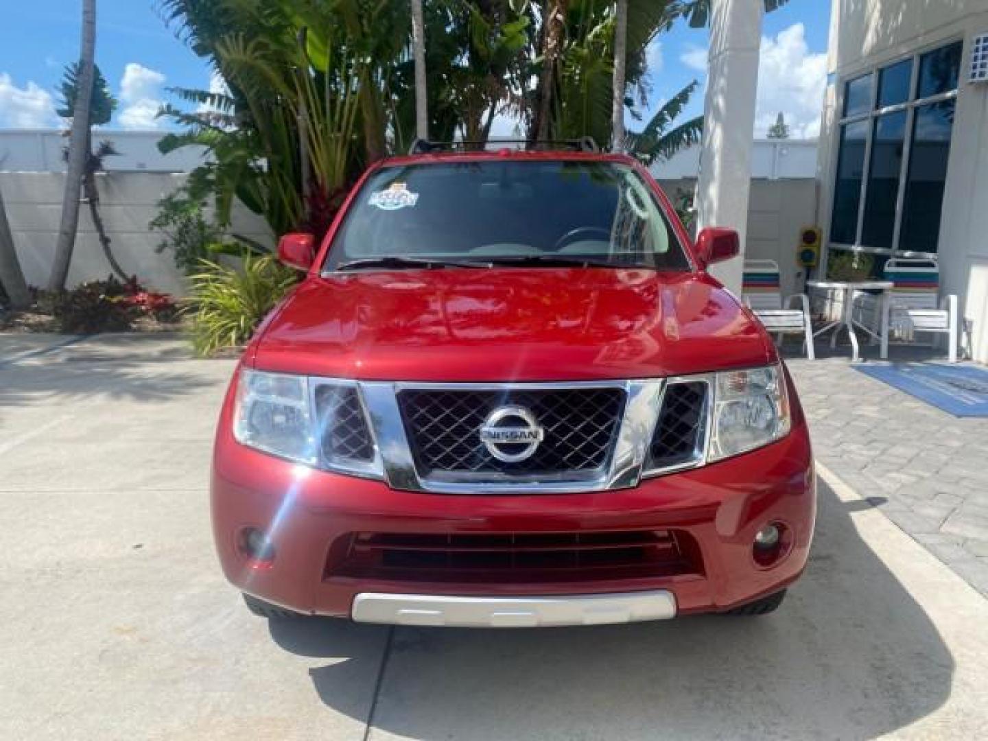 2011 Red Brick /Graphite Nissan Pathfinder LE 1 OWNER LOW MILES 54,257 (5N1AR1NN2BC) with an 4.0L DOHC 24-Valve V6 Engine engine, Automatic transmission, located at 4701 North Dixie Hwy, Pompano Beach, FL, 33064, (954) 422-2889, 26.240938, -80.123474 - OUR WEBPAGE FLORIDACARS1.COM HAS OVER 100 PHOTOS AND FREE CARFAX LINK 2011 NISSAN PATHFINDER S VIN: 5N1AR1NN2BC610435 5 N 1 A R 1 N N 2 B C 6 1 0 4 3 5 4 DOOR WAGON/SPORT UTILITY 4.0L V6 F DOHC 24V GASOLINE REAR WHEEL DRIVE Top Features Alloy Wheels BOSE Sound System Fold-Away Third Row Front Seat H - Photo#2