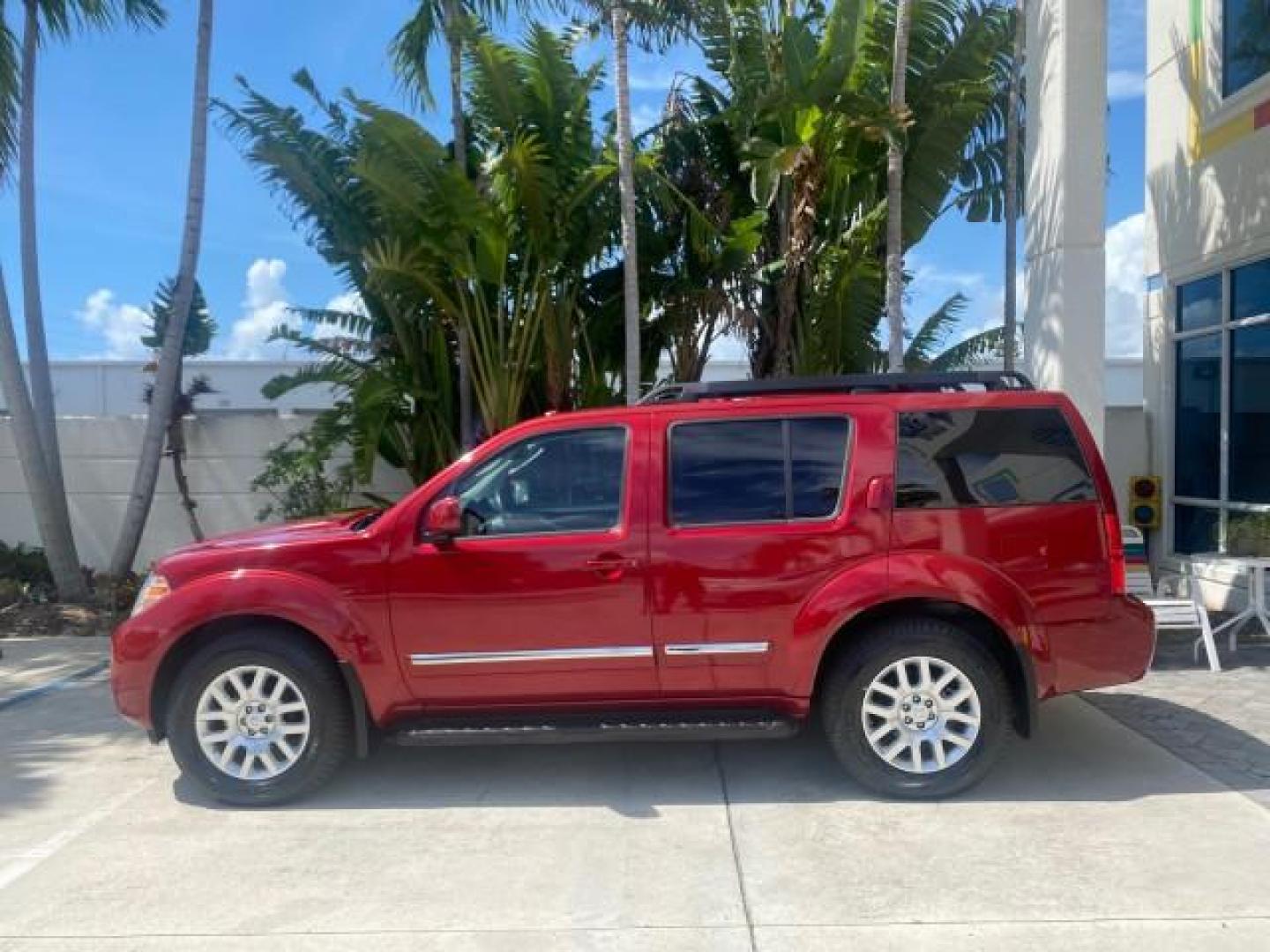 2011 Red Brick /Graphite Nissan Pathfinder LE 1 OWNER LOW MILES 54,257 (5N1AR1NN2BC) with an 4.0L DOHC 24-Valve V6 Engine engine, Automatic transmission, located at 4701 North Dixie Hwy, Pompano Beach, FL, 33064, (954) 422-2889, 26.240938, -80.123474 - OUR WEBPAGE FLORIDACARS1.COM HAS OVER 100 PHOTOS AND FREE CARFAX LINK 2011 NISSAN PATHFINDER S VIN: 5N1AR1NN2BC610435 5 N 1 A R 1 N N 2 B C 6 1 0 4 3 5 4 DOOR WAGON/SPORT UTILITY 4.0L V6 F DOHC 24V GASOLINE REAR WHEEL DRIVE Top Features Alloy Wheels BOSE Sound System Fold-Away Third Row Front Seat H - Photo#4