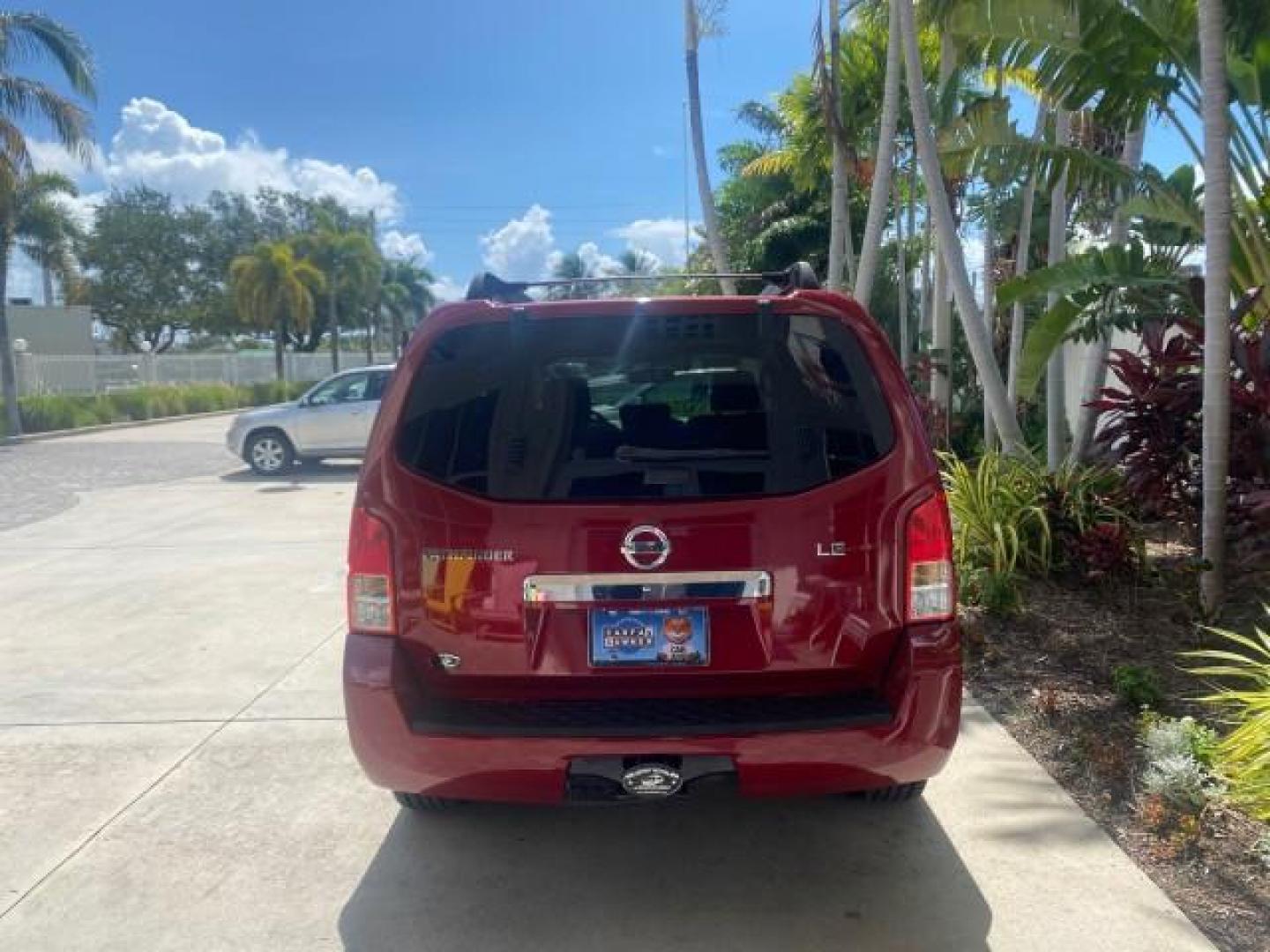 2011 Red Brick /Graphite Nissan Pathfinder LE 1 OWNER LOW MILES 54,257 (5N1AR1NN2BC) with an 4.0L DOHC 24-Valve V6 Engine engine, Automatic transmission, located at 4701 North Dixie Hwy, Pompano Beach, FL, 33064, (954) 422-2889, 26.240938, -80.123474 - OUR WEBPAGE FLORIDACARS1.COM HAS OVER 100 PHOTOS AND FREE CARFAX LINK 2011 NISSAN PATHFINDER S VIN: 5N1AR1NN2BC610435 5 N 1 A R 1 N N 2 B C 6 1 0 4 3 5 4 DOOR WAGON/SPORT UTILITY 4.0L V6 F DOHC 24V GASOLINE REAR WHEEL DRIVE Top Features Alloy Wheels BOSE Sound System Fold-Away Third Row Front Seat H - Photo#6