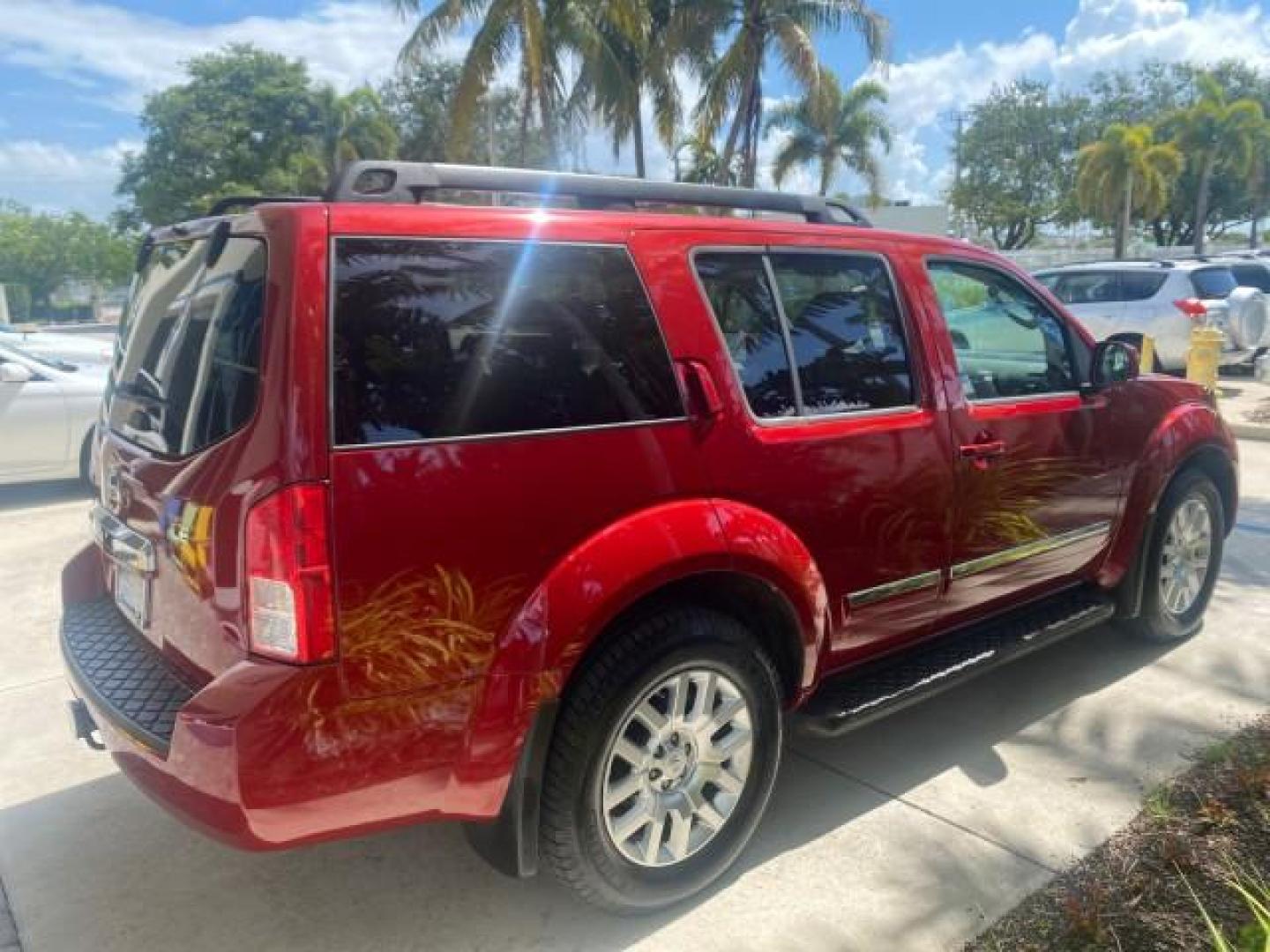 2011 Red Brick /Graphite Nissan Pathfinder LE 1 OWNER LOW MILES 54,257 (5N1AR1NN2BC) with an 4.0L DOHC 24-Valve V6 Engine engine, Automatic transmission, located at 4701 North Dixie Hwy, Pompano Beach, FL, 33064, (954) 422-2889, 26.240938, -80.123474 - OUR WEBPAGE FLORIDACARS1.COM HAS OVER 100 PHOTOS AND FREE CARFAX LINK 2011 NISSAN PATHFINDER S VIN: 5N1AR1NN2BC610435 5 N 1 A R 1 N N 2 B C 6 1 0 4 3 5 4 DOOR WAGON/SPORT UTILITY 4.0L V6 F DOHC 24V GASOLINE REAR WHEEL DRIVE Top Features Alloy Wheels BOSE Sound System Fold-Away Third Row Front Seat H - Photo#7