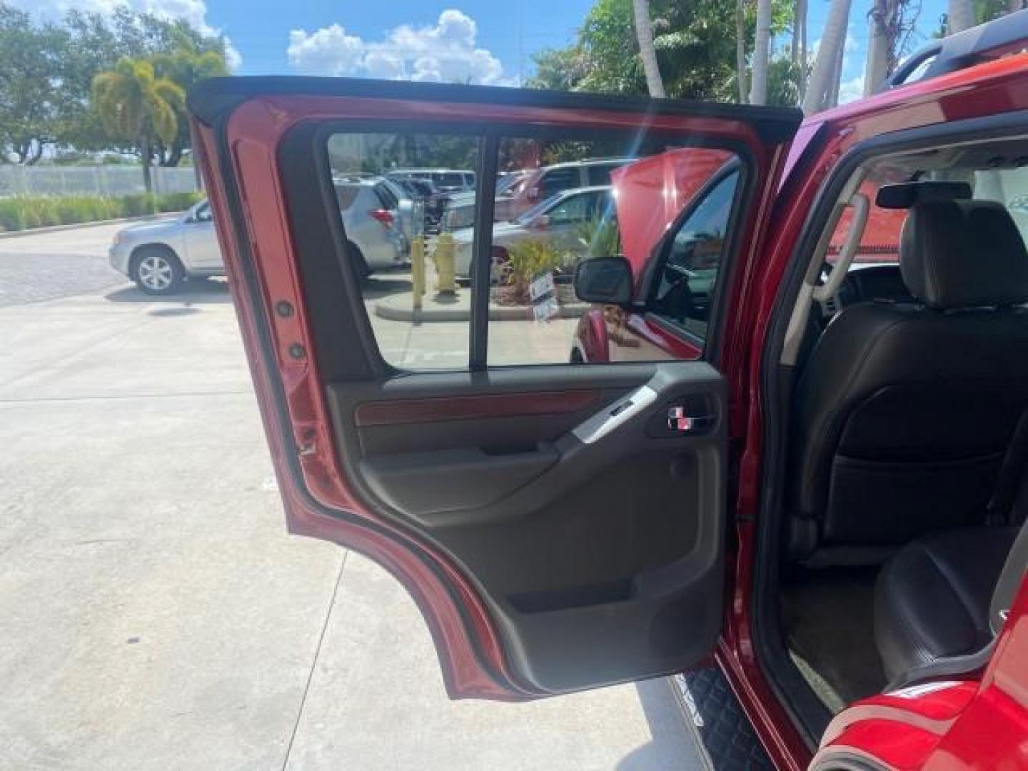 2011 Red Brick /Graphite Nissan Pathfinder LE 1 OWNER LOW MILES 54,257 (5N1AR1NN2BC) with an 4.0L DOHC 24-Valve V6 Engine engine, Automatic transmission, located at 4701 North Dixie Hwy, Pompano Beach, FL, 33064, (954) 422-2889, 26.240938, -80.123474 - OUR WEBPAGE FLORIDACARS1.COM HAS OVER 100 PHOTOS AND FREE CARFAX LINK 2011 NISSAN PATHFINDER S VIN: 5N1AR1NN2BC610435 5 N 1 A R 1 N N 2 B C 6 1 0 4 3 5 4 DOOR WAGON/SPORT UTILITY 4.0L V6 F DOHC 24V GASOLINE REAR WHEEL DRIVE Top Features Alloy Wheels BOSE Sound System Fold-Away Third Row Front Seat H - Photo#13