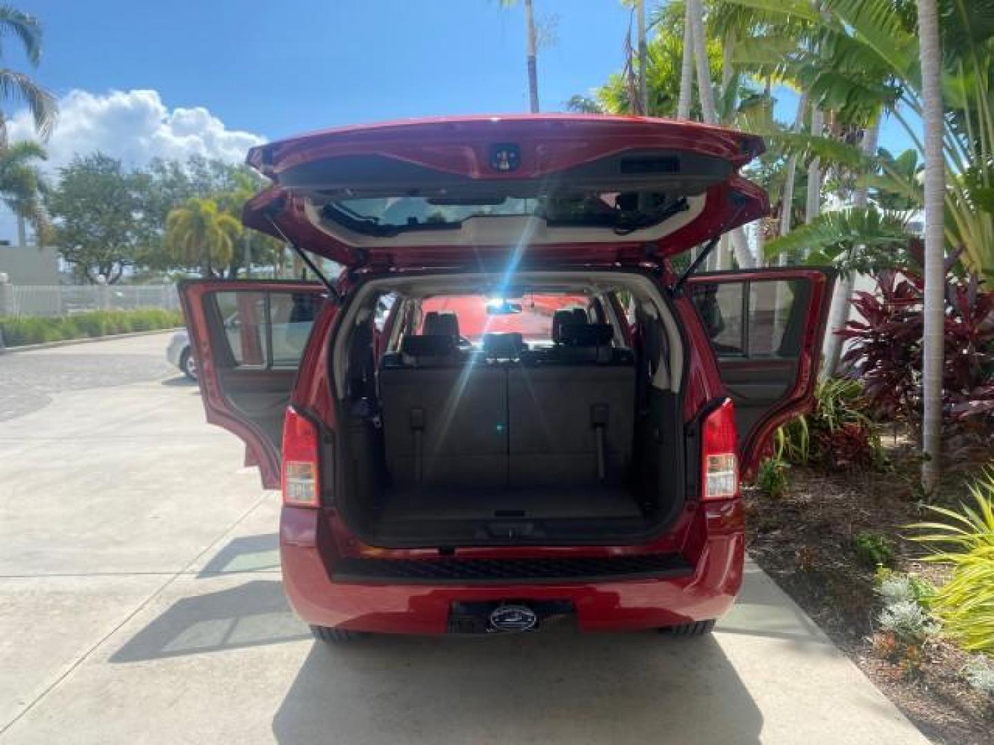2011 Red Brick /Graphite Nissan Pathfinder LE 1 OWNER LOW MILES 54,257 (5N1AR1NN2BC) with an 4.0L DOHC 24-Valve V6 Engine engine, Automatic transmission, located at 4701 North Dixie Hwy, Pompano Beach, FL, 33064, (954) 422-2889, 26.240938, -80.123474 - OUR WEBPAGE FLORIDACARS1.COM HAS OVER 100 PHOTOS AND FREE CARFAX LINK 2011 NISSAN PATHFINDER S VIN: 5N1AR1NN2BC610435 5 N 1 A R 1 N N 2 B C 6 1 0 4 3 5 4 DOOR WAGON/SPORT UTILITY 4.0L V6 F DOHC 24V GASOLINE REAR WHEEL DRIVE Top Features Alloy Wheels BOSE Sound System Fold-Away Third Row Front Seat H - Photo#15