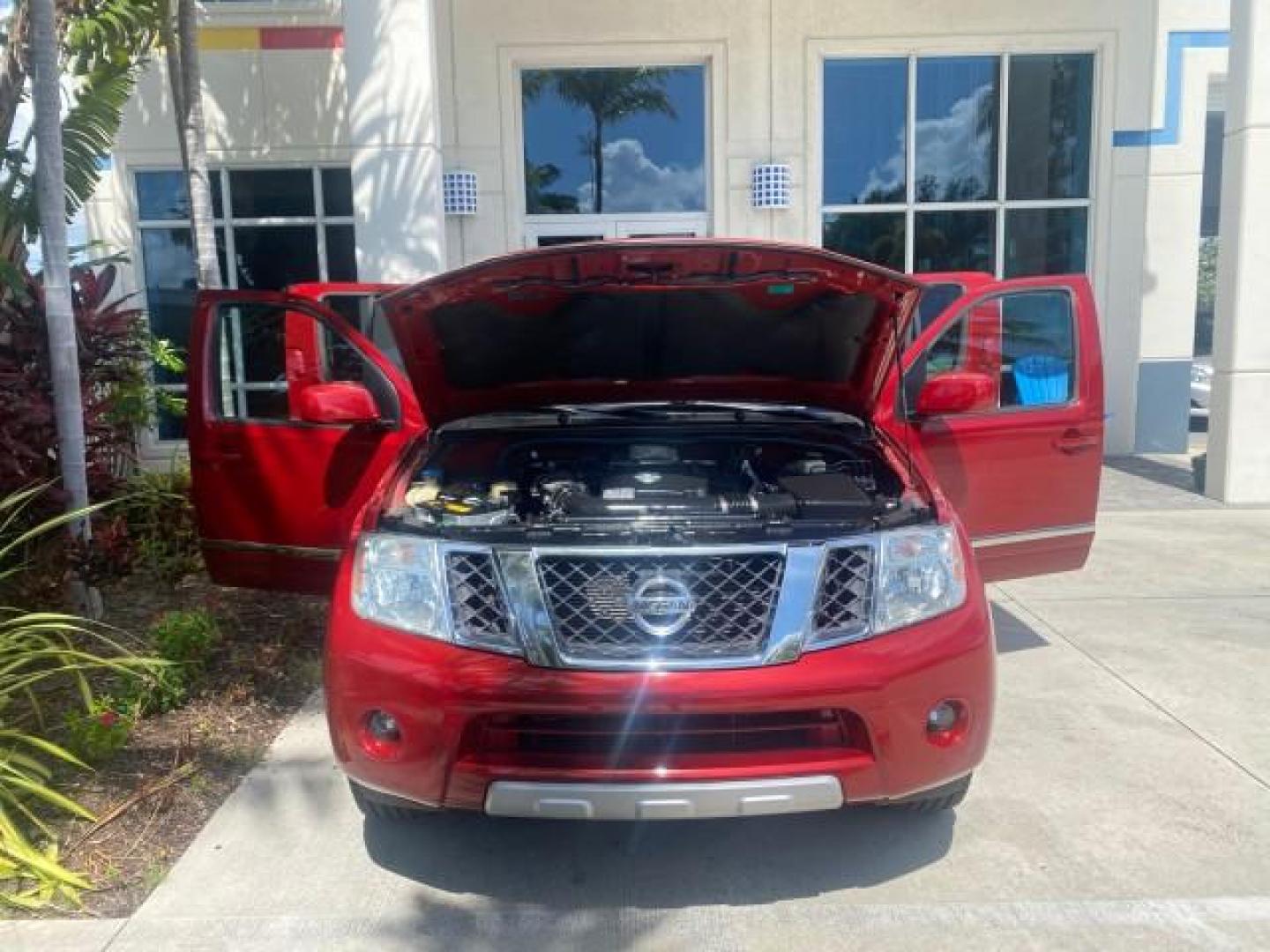2011 Red Brick /Graphite Nissan Pathfinder LE 1 OWNER LOW MILES 54,257 (5N1AR1NN2BC) with an 4.0L DOHC 24-Valve V6 Engine engine, Automatic transmission, located at 4701 North Dixie Hwy, Pompano Beach, FL, 33064, (954) 422-2889, 26.240938, -80.123474 - OUR WEBPAGE FLORIDACARS1.COM HAS OVER 100 PHOTOS AND FREE CARFAX LINK 2011 NISSAN PATHFINDER S VIN: 5N1AR1NN2BC610435 5 N 1 A R 1 N N 2 B C 6 1 0 4 3 5 4 DOOR WAGON/SPORT UTILITY 4.0L V6 F DOHC 24V GASOLINE REAR WHEEL DRIVE Top Features Alloy Wheels BOSE Sound System Fold-Away Third Row Front Seat H - Photo#16