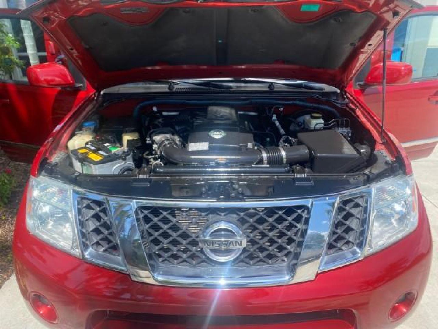 2011 Red Brick /Graphite Nissan Pathfinder LE 1 OWNER LOW MILES 54,257 (5N1AR1NN2BC) with an 4.0L DOHC 24-Valve V6 Engine engine, Automatic transmission, located at 4701 North Dixie Hwy, Pompano Beach, FL, 33064, (954) 422-2889, 26.240938, -80.123474 - OUR WEBPAGE FLORIDACARS1.COM HAS OVER 100 PHOTOS AND FREE CARFAX LINK 2011 NISSAN PATHFINDER S VIN: 5N1AR1NN2BC610435 5 N 1 A R 1 N N 2 B C 6 1 0 4 3 5 4 DOOR WAGON/SPORT UTILITY 4.0L V6 F DOHC 24V GASOLINE REAR WHEEL DRIVE Top Features Alloy Wheels BOSE Sound System Fold-Away Third Row Front Seat H - Photo#17