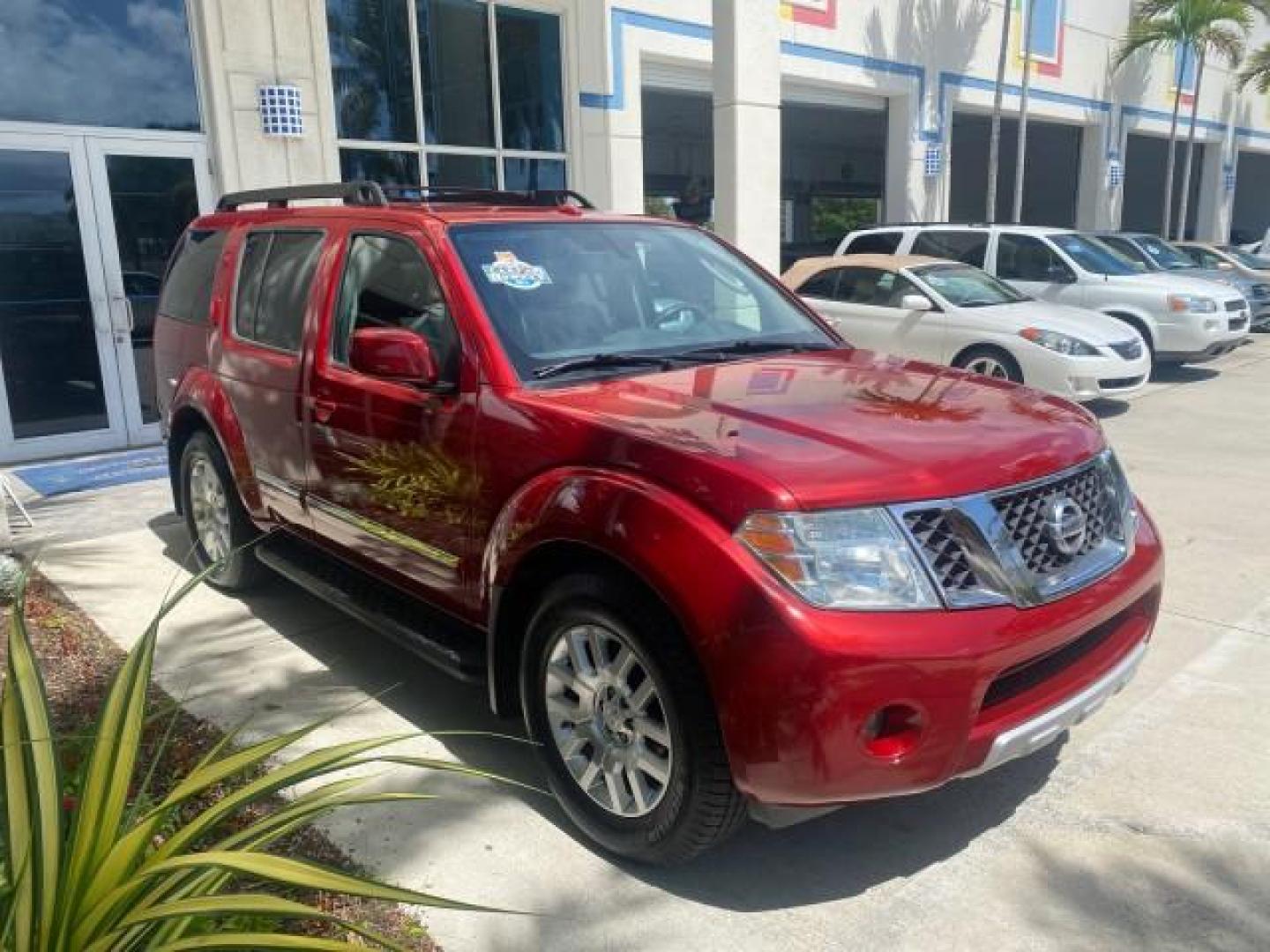 2011 Red Brick /Graphite Nissan Pathfinder LE 1 OWNER LOW MILES 54,257 (5N1AR1NN2BC) with an 4.0L DOHC 24-Valve V6 Engine engine, Automatic transmission, located at 4701 North Dixie Hwy, Pompano Beach, FL, 33064, (954) 422-2889, 26.240938, -80.123474 - OUR WEBPAGE FLORIDACARS1.COM HAS OVER 100 PHOTOS AND FREE CARFAX LINK 2011 NISSAN PATHFINDER S VIN: 5N1AR1NN2BC610435 5 N 1 A R 1 N N 2 B C 6 1 0 4 3 5 4 DOOR WAGON/SPORT UTILITY 4.0L V6 F DOHC 24V GASOLINE REAR WHEEL DRIVE Top Features Alloy Wheels BOSE Sound System Fold-Away Third Row Front Seat H - Photo#24