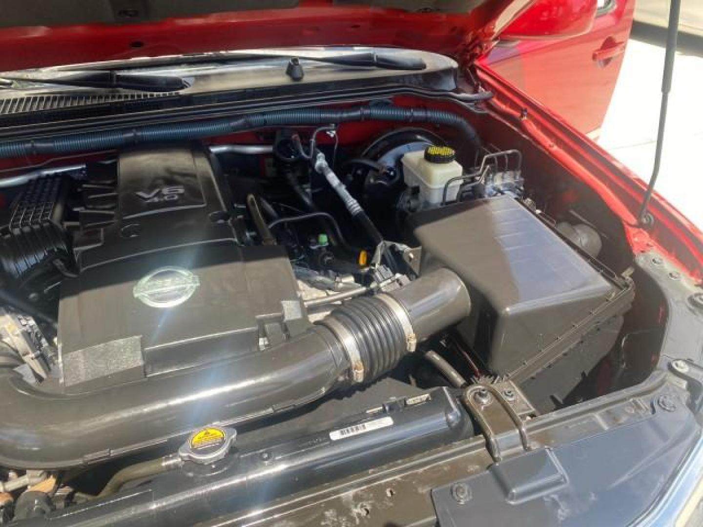 2011 Red Brick /Graphite Nissan Pathfinder LE 1 OWNER LOW MILES 54,257 (5N1AR1NN2BC) with an 4.0L DOHC 24-Valve V6 Engine engine, Automatic transmission, located at 4701 North Dixie Hwy, Pompano Beach, FL, 33064, (954) 422-2889, 26.240938, -80.123474 - OUR WEBPAGE FLORIDACARS1.COM HAS OVER 100 PHOTOS AND FREE CARFAX LINK 2011 NISSAN PATHFINDER S VIN: 5N1AR1NN2BC610435 5 N 1 A R 1 N N 2 B C 6 1 0 4 3 5 4 DOOR WAGON/SPORT UTILITY 4.0L V6 F DOHC 24V GASOLINE REAR WHEEL DRIVE Top Features Alloy Wheels BOSE Sound System Fold-Away Third Row Front Seat H - Photo#26