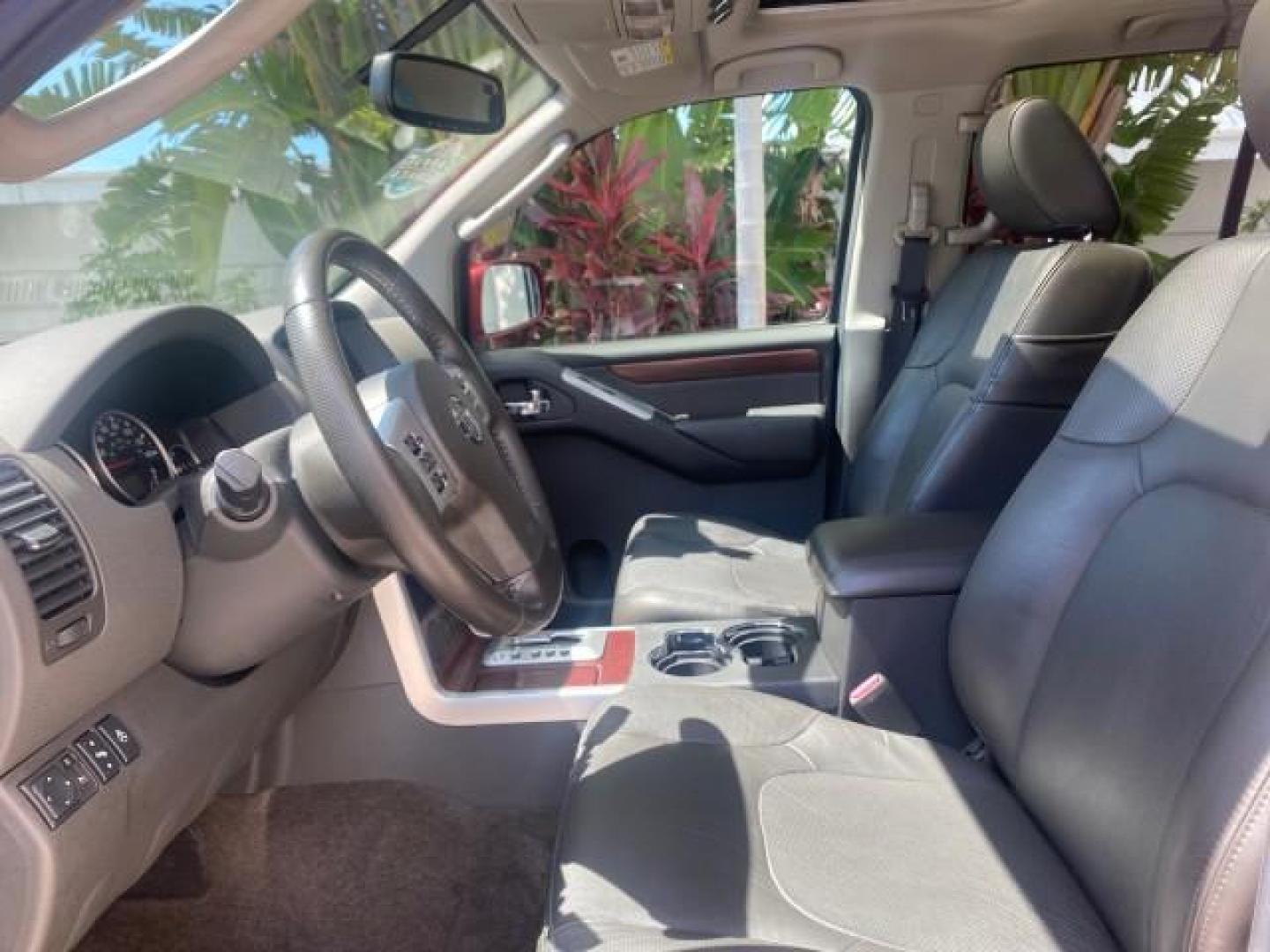 2011 Red Brick /Graphite Nissan Pathfinder LE 1 OWNER LOW MILES 54,257 (5N1AR1NN2BC) with an 4.0L DOHC 24-Valve V6 Engine engine, Automatic transmission, located at 4701 North Dixie Hwy, Pompano Beach, FL, 33064, (954) 422-2889, 26.240938, -80.123474 - OUR WEBPAGE FLORIDACARS1.COM HAS OVER 100 PHOTOS AND FREE CARFAX LINK 2011 NISSAN PATHFINDER S VIN: 5N1AR1NN2BC610435 5 N 1 A R 1 N N 2 B C 6 1 0 4 3 5 4 DOOR WAGON/SPORT UTILITY 4.0L V6 F DOHC 24V GASOLINE REAR WHEEL DRIVE Top Features Alloy Wheels BOSE Sound System Fold-Away Third Row Front Seat H - Photo#35
