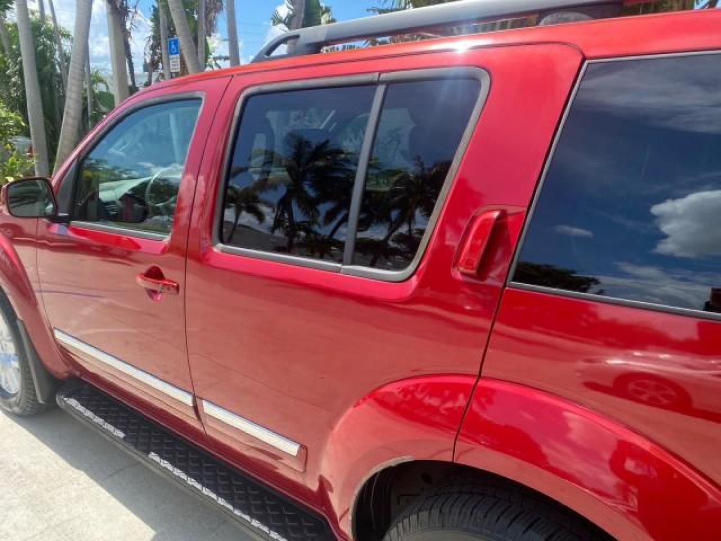 2011 Red Brick /Graphite Nissan Pathfinder LE 1 OWNER LOW MILES 54,257 (5N1AR1NN2BC) with an 4.0L DOHC 24-Valve V6 Engine engine, Automatic transmission, located at 4701 North Dixie Hwy, Pompano Beach, FL, 33064, (954) 422-2889, 26.240938, -80.123474 - OUR WEBPAGE FLORIDACARS1.COM HAS OVER 100 PHOTOS AND FREE CARFAX LINK 2011 NISSAN PATHFINDER S VIN: 5N1AR1NN2BC610435 5 N 1 A R 1 N N 2 B C 6 1 0 4 3 5 4 DOOR WAGON/SPORT UTILITY 4.0L V6 F DOHC 24V GASOLINE REAR WHEEL DRIVE Top Features Alloy Wheels BOSE Sound System Fold-Away Third Row Front Seat H - Photo#67
