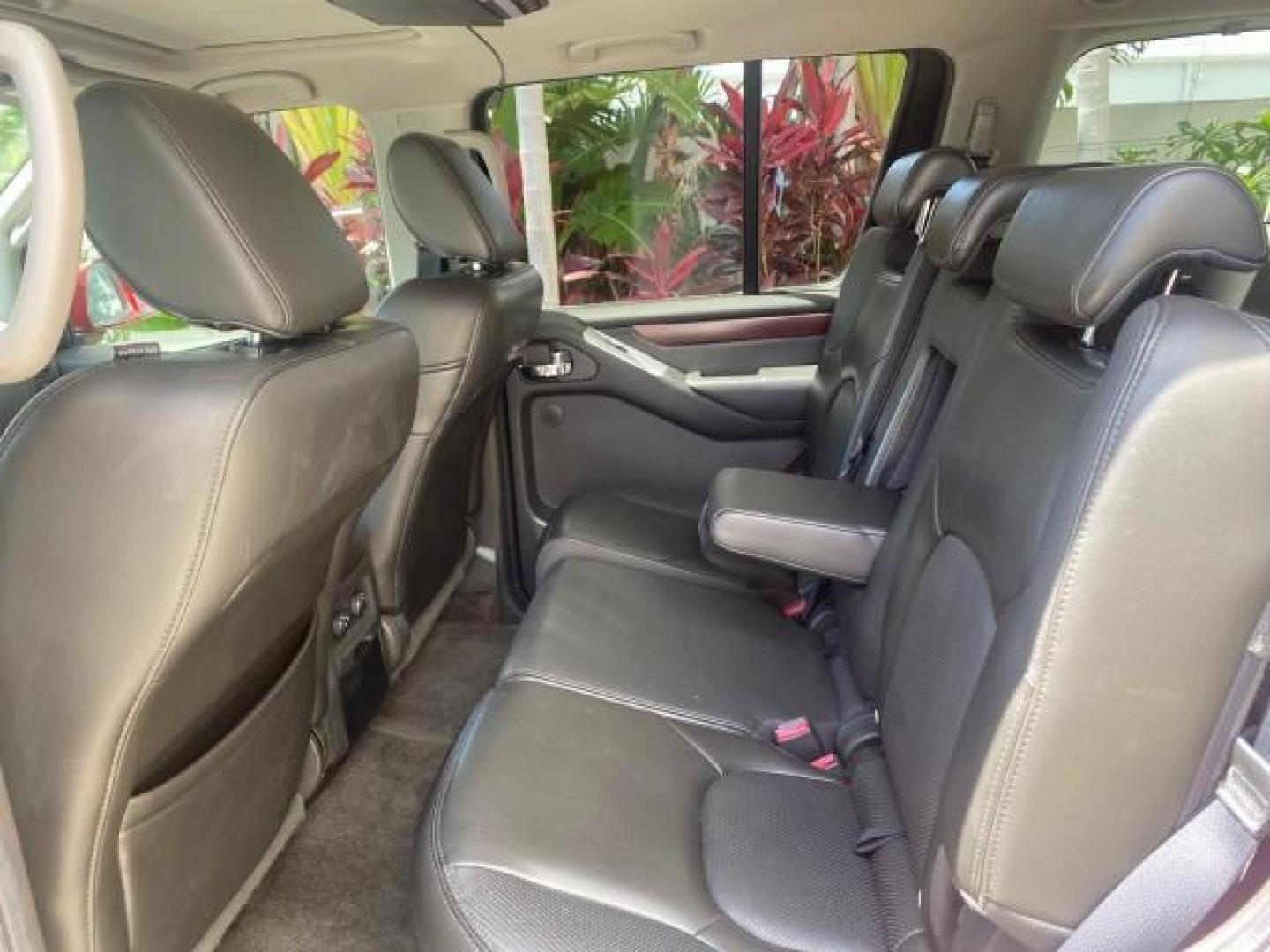 2011 Red Brick /Graphite Nissan Pathfinder LE 1 OWNER LOW MILES 54,257 (5N1AR1NN2BC) with an 4.0L DOHC 24-Valve V6 Engine engine, Automatic transmission, located at 4701 North Dixie Hwy, Pompano Beach, FL, 33064, (954) 422-2889, 26.240938, -80.123474 - OUR WEBPAGE FLORIDACARS1.COM HAS OVER 100 PHOTOS AND FREE CARFAX LINK 2011 NISSAN PATHFINDER S VIN: 5N1AR1NN2BC610435 5 N 1 A R 1 N N 2 B C 6 1 0 4 3 5 4 DOOR WAGON/SPORT UTILITY 4.0L V6 F DOHC 24V GASOLINE REAR WHEEL DRIVE Top Features Alloy Wheels BOSE Sound System Fold-Away Third Row Front Seat H - Photo#72