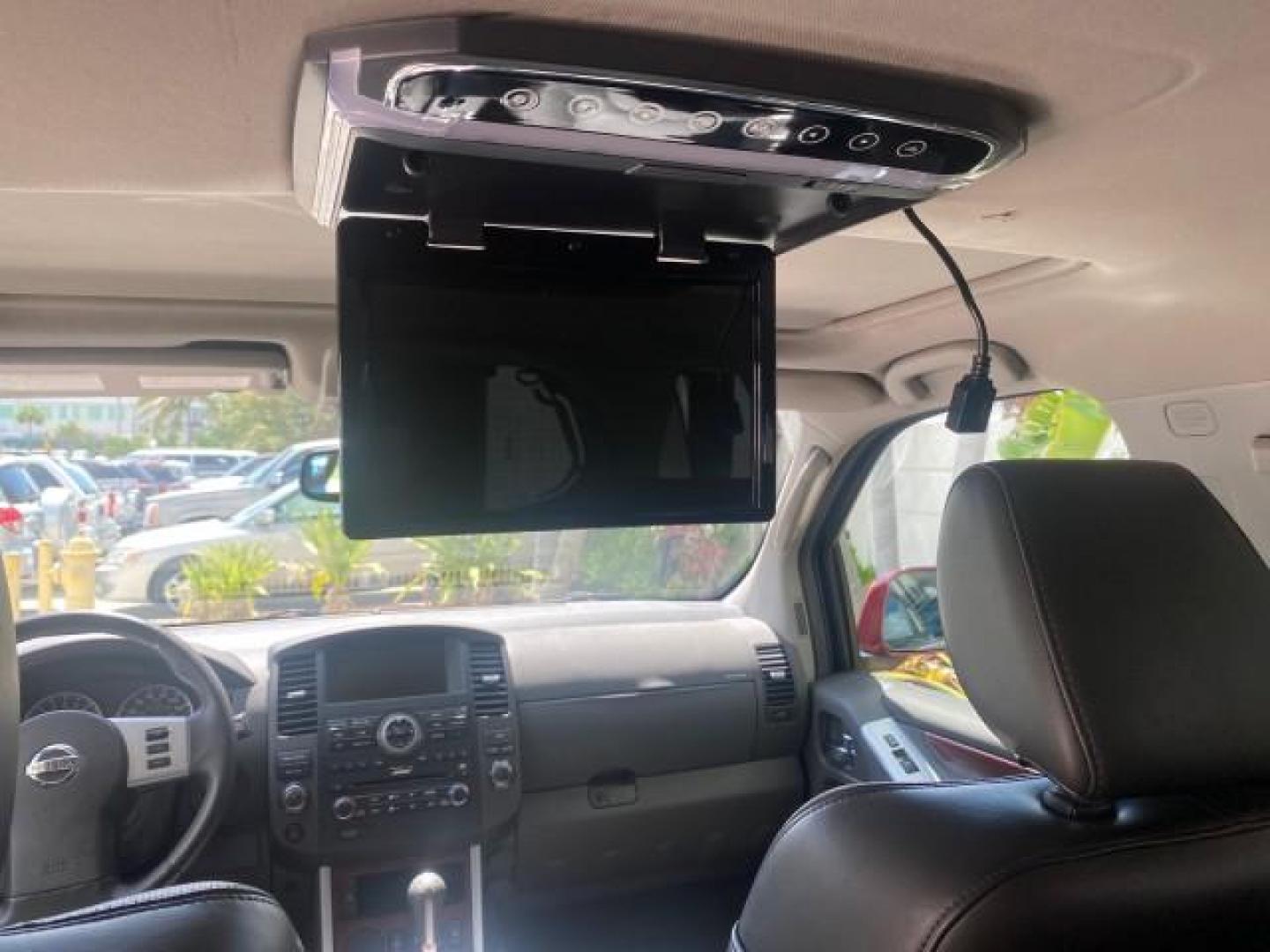 2011 Red Brick /Graphite Nissan Pathfinder LE 1 OWNER LOW MILES 54,257 (5N1AR1NN2BC) with an 4.0L DOHC 24-Valve V6 Engine engine, Automatic transmission, located at 4701 North Dixie Hwy, Pompano Beach, FL, 33064, (954) 422-2889, 26.240938, -80.123474 - OUR WEBPAGE FLORIDACARS1.COM HAS OVER 100 PHOTOS AND FREE CARFAX LINK 2011 NISSAN PATHFINDER S VIN: 5N1AR1NN2BC610435 5 N 1 A R 1 N N 2 B C 6 1 0 4 3 5 4 DOOR WAGON/SPORT UTILITY 4.0L V6 F DOHC 24V GASOLINE REAR WHEEL DRIVE Top Features Alloy Wheels BOSE Sound System Fold-Away Third Row Front Seat H - Photo#78