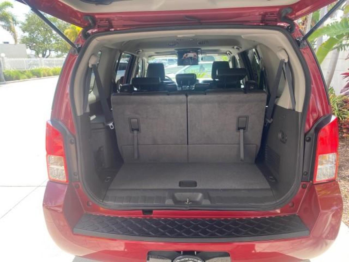 2011 Red Brick /Graphite Nissan Pathfinder LE 1 OWNER LOW MILES 54,257 (5N1AR1NN2BC) with an 4.0L DOHC 24-Valve V6 Engine engine, Automatic transmission, located at 4701 North Dixie Hwy, Pompano Beach, FL, 33064, (954) 422-2889, 26.240938, -80.123474 - OUR WEBPAGE FLORIDACARS1.COM HAS OVER 100 PHOTOS AND FREE CARFAX LINK 2011 NISSAN PATHFINDER S VIN: 5N1AR1NN2BC610435 5 N 1 A R 1 N N 2 B C 6 1 0 4 3 5 4 DOOR WAGON/SPORT UTILITY 4.0L V6 F DOHC 24V GASOLINE REAR WHEEL DRIVE Top Features Alloy Wheels BOSE Sound System Fold-Away Third Row Front Seat H - Photo#92