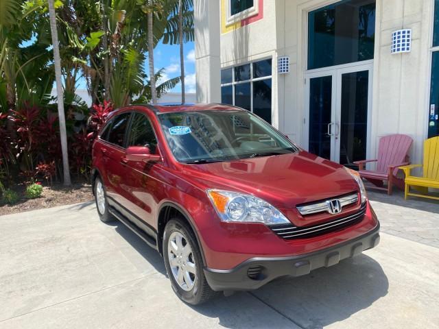 2008 Tango Red Pearl /Gray Honda CR-V EX-L LOW MILES 67,980 (JHLRE38708C) with an 2.4L DOHC MPFI 16-Valve i-VTEC I4 Engine engine, Automatic transmission, located at 4701 North Dixie Hwy, Pompano Beach, FL, 33064, (954) 422-2889, 26.240938, -80.123474 - OUR WEBPAGE FLORIDACARS1.COM HAS OVER 100 PHOTOS AND FREE CARFAX LINK 2008 HONDA CR-V EX-L VIN:JHLRE38708C027319 4 DOOR WAGON/SPORT UTILITY 2.4L I4 F DOHC 16V GASOLINE FRONT WHEEL DRIVE Top Features Alloy Wheels Front Seat Heaters Leather Seats Running Boards Satellite Radio Ready Sunroof(s) Basic F - Photo#1