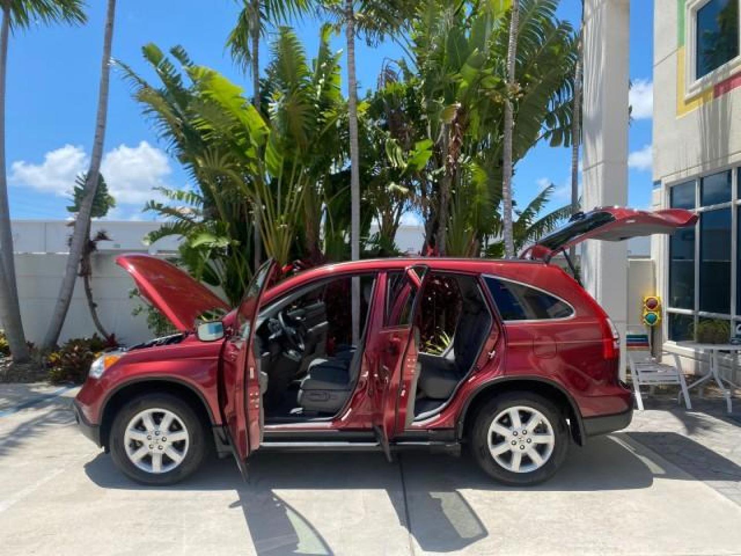2008 Tango Red Pearl /Gray Honda CR-V EX-L LOW MILES 67,975 (JHLRE38708C) with an 2.4L DOHC MPFI 16-Valve i-VTEC I4 Engine engine, Automatic transmission, located at 4701 North Dixie Hwy, Pompano Beach, FL, 33064, (954) 422-2889, 26.240938, -80.123474 - OUR WEBPAGE FLORIDACARS1.COM HAS OVER 100 PHOTOS AND FREE CARFAX LINK 2008 HONDA CR-V EX-L VIN:JHLRE38708C027319 4 DOOR WAGON/SPORT UTILITY 2.4L I4 F DOHC 16V GASOLINE FRONT WHEEL DRIVE Top Features Alloy Wheels Front Seat Heaters Leather Seats Running Boards Satellite Radio Ready Sunroof(s) Basic F - Photo#8