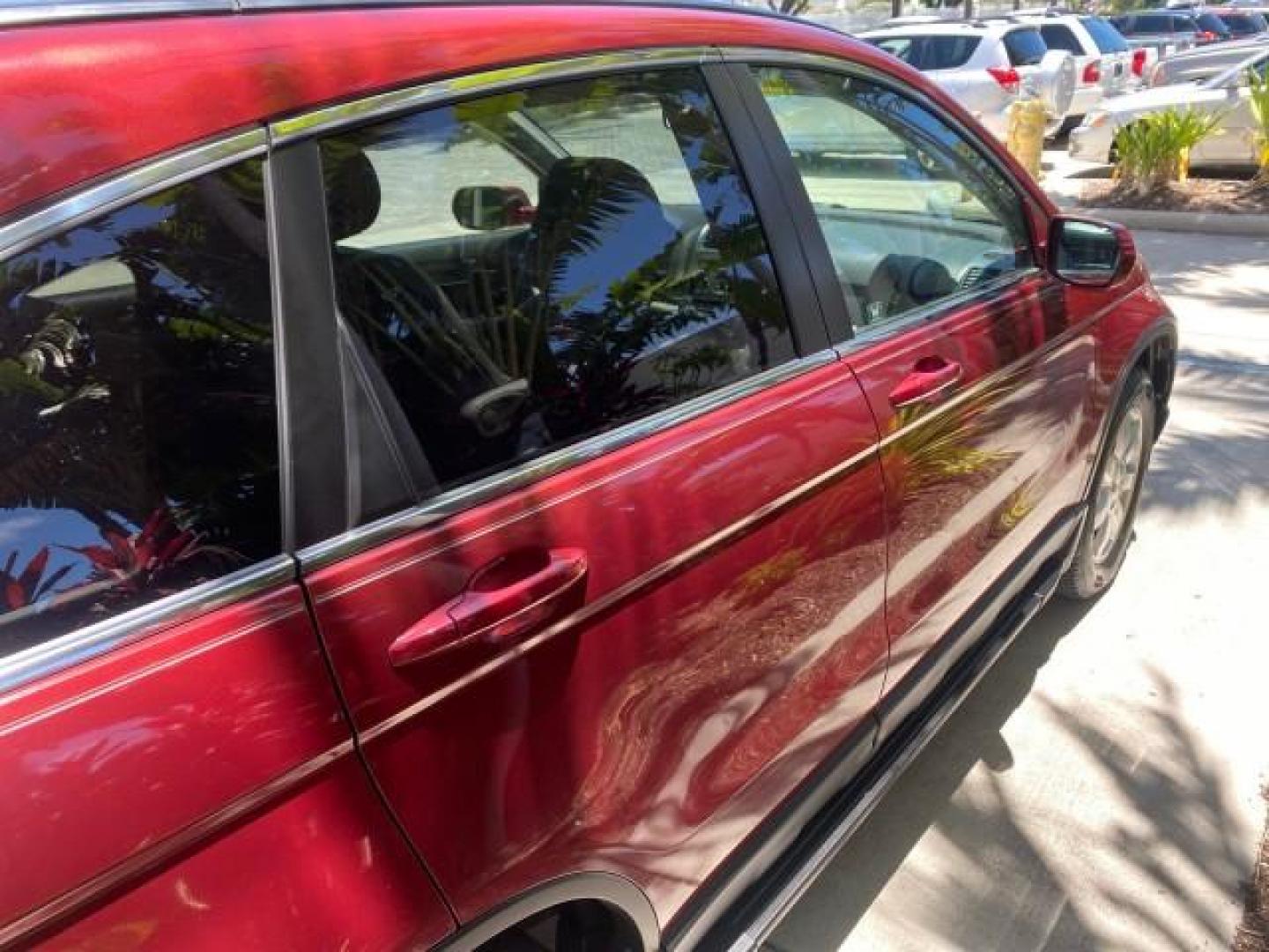 2008 Tango Red Pearl /Gray Honda CR-V EX-L LOW MILES 67,975 (JHLRE38708C) with an 2.4L DOHC MPFI 16-Valve i-VTEC I4 Engine engine, Automatic transmission, located at 4701 North Dixie Hwy, Pompano Beach, FL, 33064, (954) 422-2889, 26.240938, -80.123474 - OUR WEBPAGE FLORIDACARS1.COM HAS OVER 100 PHOTOS AND FREE CARFAX LINK 2008 HONDA CR-V EX-L VIN:JHLRE38708C027319 4 DOOR WAGON/SPORT UTILITY 2.4L I4 F DOHC 16V GASOLINE FRONT WHEEL DRIVE Top Features Alloy Wheels Front Seat Heaters Leather Seats Running Boards Satellite Radio Ready Sunroof(s) Basic F - Photo#94