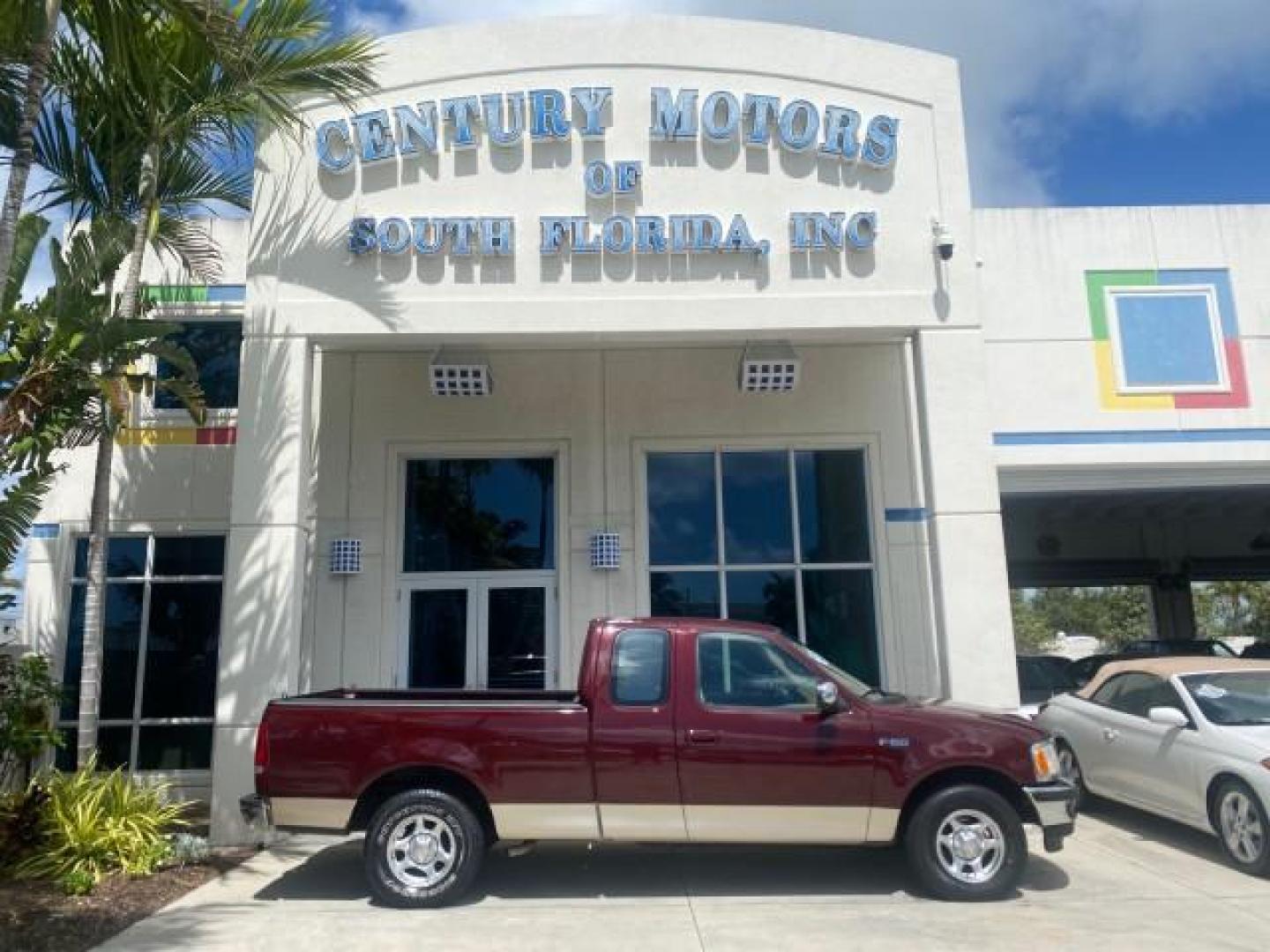 1997 Dark Toreador Red (CC/Met) /Medium Prarie Tan Ford F-150 XLT 1 OWNER LOW MILES 74,027 (1FTDX17W5VK) with an 4.6L EFI OHC V8 Triton Engine engine, Automatic transmission, located at 4701 North Dixie Hwy, Pompano Beach, FL, 33064, (954) 422-2889, 26.240938, -80.123474 - OUR WEBPAGE FLORIDACARS1.COM HAS OVER 100 PHOTOS AND FREE CARFAX LINK 1997 FORD F-150 XLT VIN: 1FTDX17W5VKB56866 1 F T D X 1 7 W 5 V K B 5 6 8 6 6 3 DOOR EXTENDED CAB PICKUP 4.6L V8 F GASOLINE REAR WHEEL DRIVE Top Features Cloth Seats Tow Hitch Basic Features ABS Brakes AM/FM Stereo Air Conditioning - Photo#0