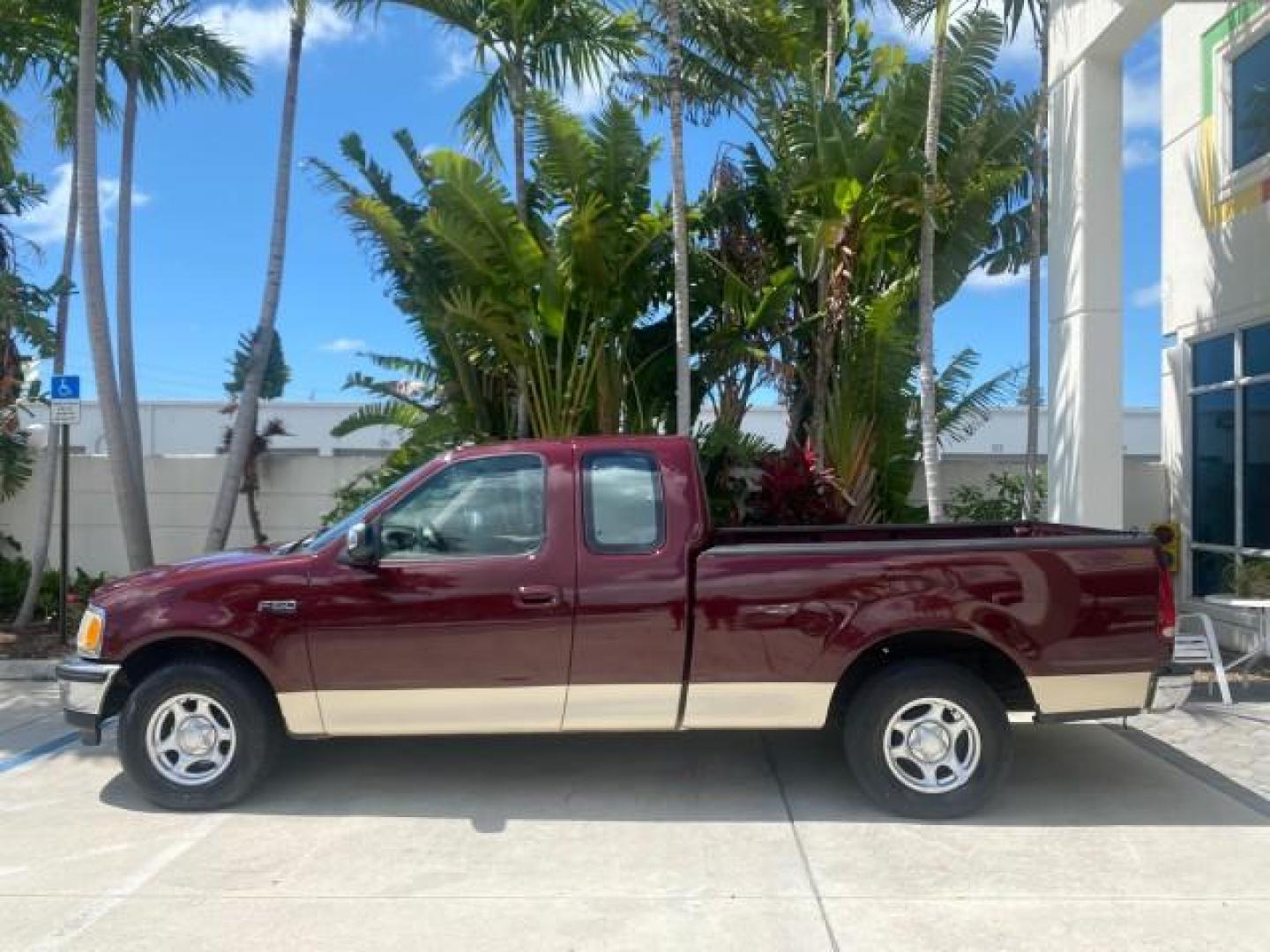 1997 Dark Toreador Red (CC/Met) /Medium Prarie Tan Ford F-150 XLT 1 OWNER LOW MILES 74,027 (1FTDX17W5VK) with an 4.6L EFI OHC V8 Triton Engine engine, Automatic transmission, located at 4701 North Dixie Hwy, Pompano Beach, FL, 33064, (954) 422-2889, 26.240938, -80.123474 - OUR WEBPAGE FLORIDACARS1.COM HAS OVER 100 PHOTOS AND FREE CARFAX LINK 1997 FORD F-150 XLT VIN: 1FTDX17W5VKB56866 1 F T D X 1 7 W 5 V K B 5 6 8 6 6 3 DOOR EXTENDED CAB PICKUP 4.6L V8 F GASOLINE REAR WHEEL DRIVE Top Features Cloth Seats Tow Hitch Basic Features ABS Brakes AM/FM Stereo Air Conditioning - Photo#4